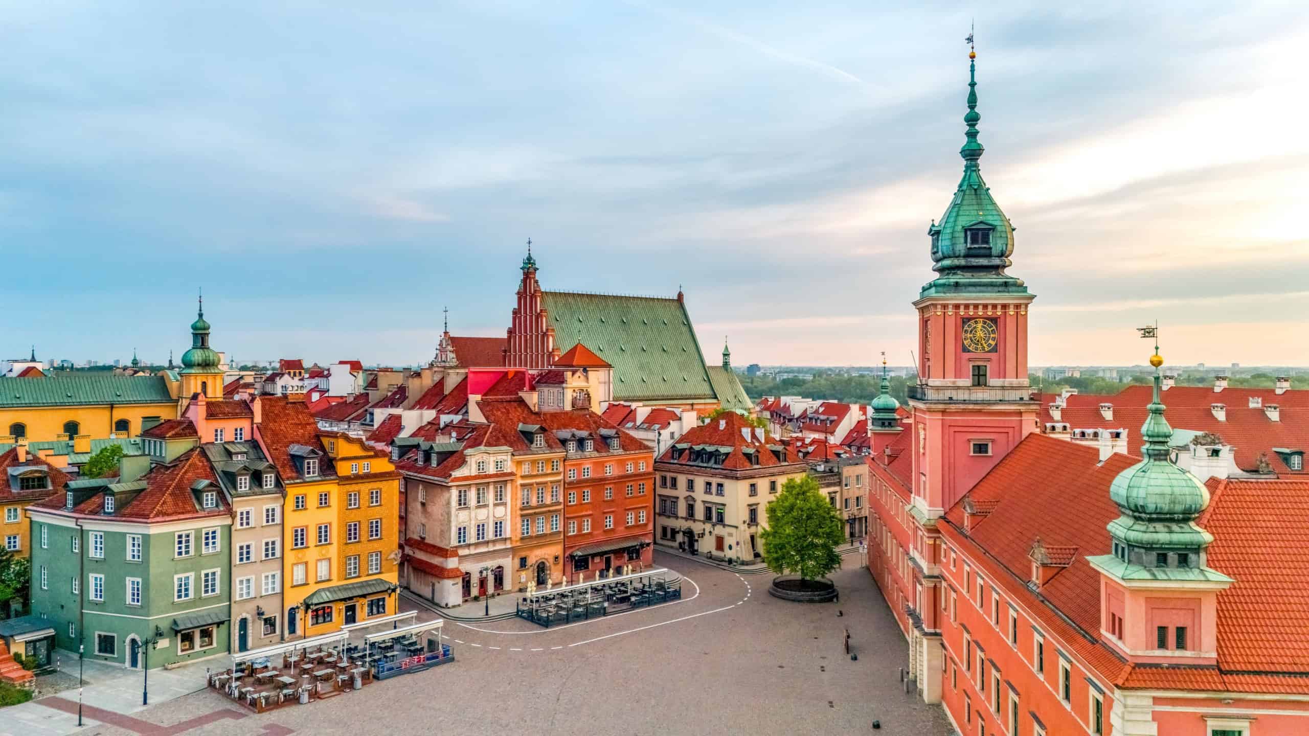 aerial view over the castle square in warsaw overlooking the old town in spring at dawn