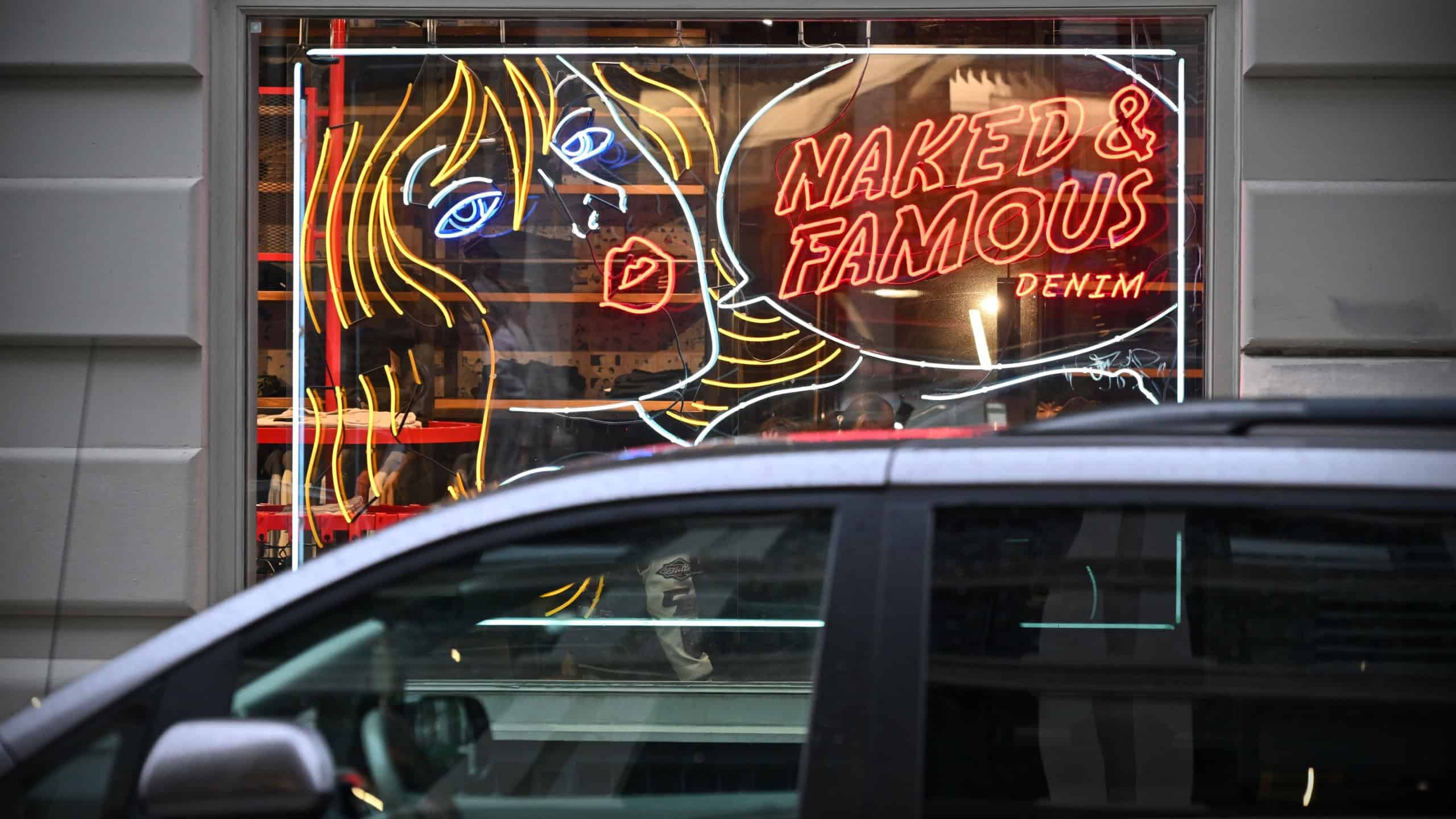 A Naked and Famous Denim store window is seen on a Manhattan street on November 22, 2024 in New York City, USA. Naked and Famous Denim is a Canadian brand known for its high-quality Japanese denim.