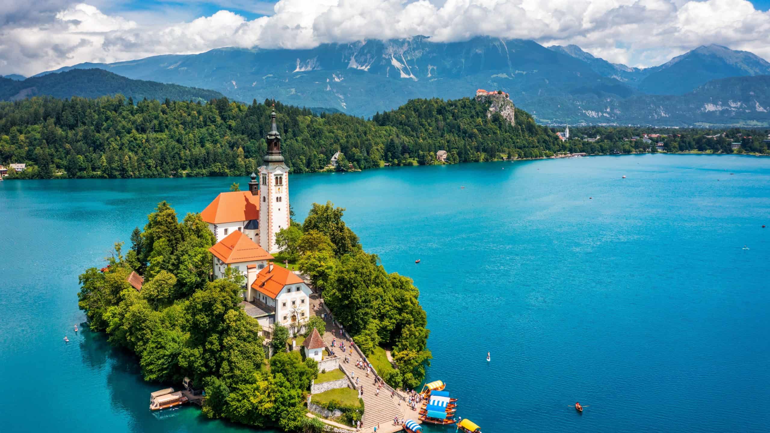 Lake Bled in Slovenia. Beautiful mountains and Bled lake with small Pilgrimage Church. Bled lake and island with Pilgrimage Church of the Assumption of Maria. Bled, Slovenia, Europe.