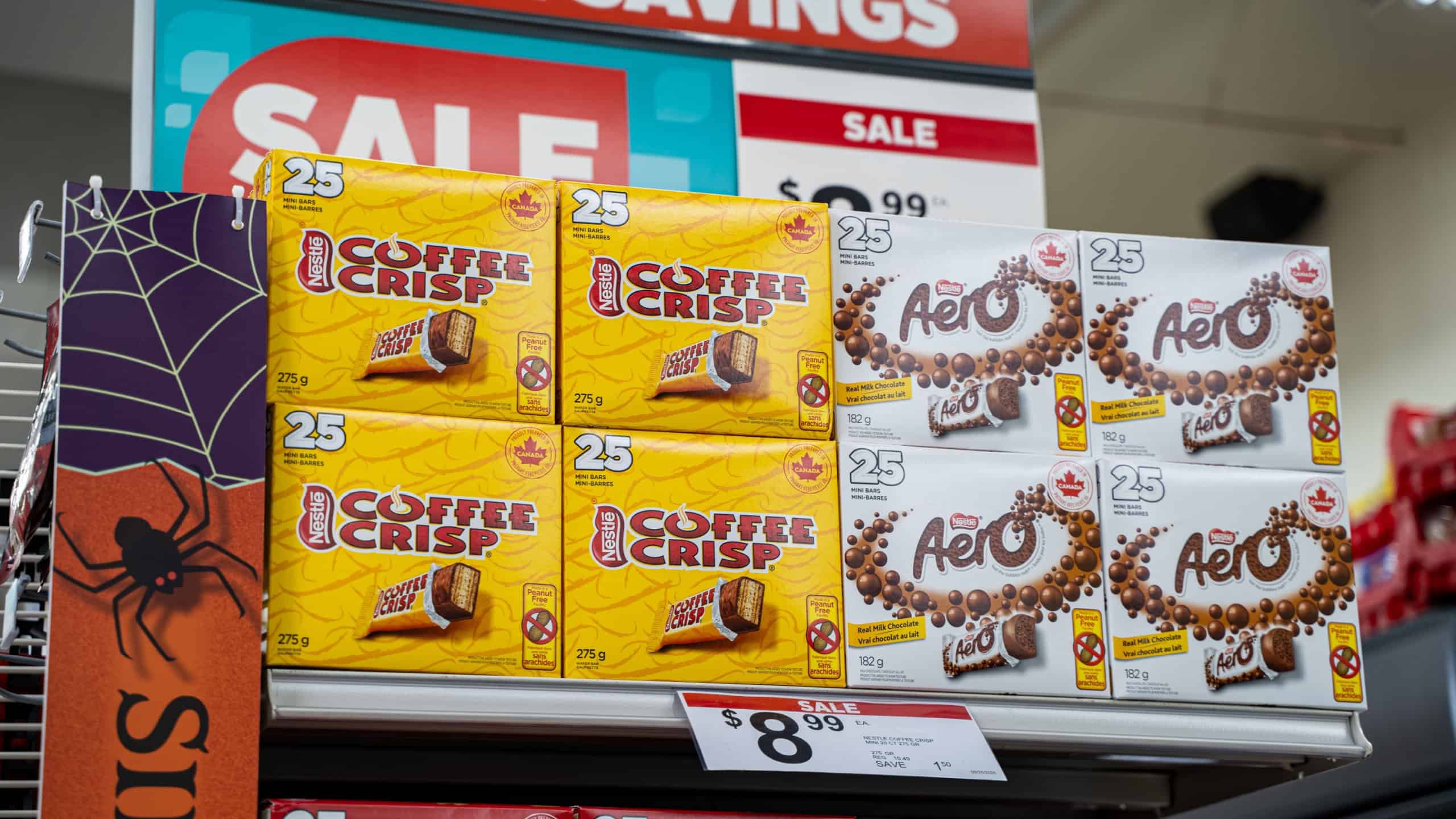 View of Nestle Coffee Crisp and Aero chocolate boxes on sale display. Toronto, Canada - September 20, 2025.