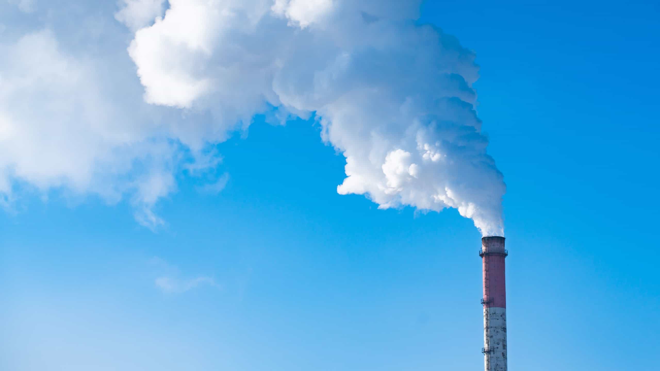 Smoke stack with smoke emission. Plant pipes pollute atmosphere. Industrial factory pollution, smokestack exhaust gases, Climate change