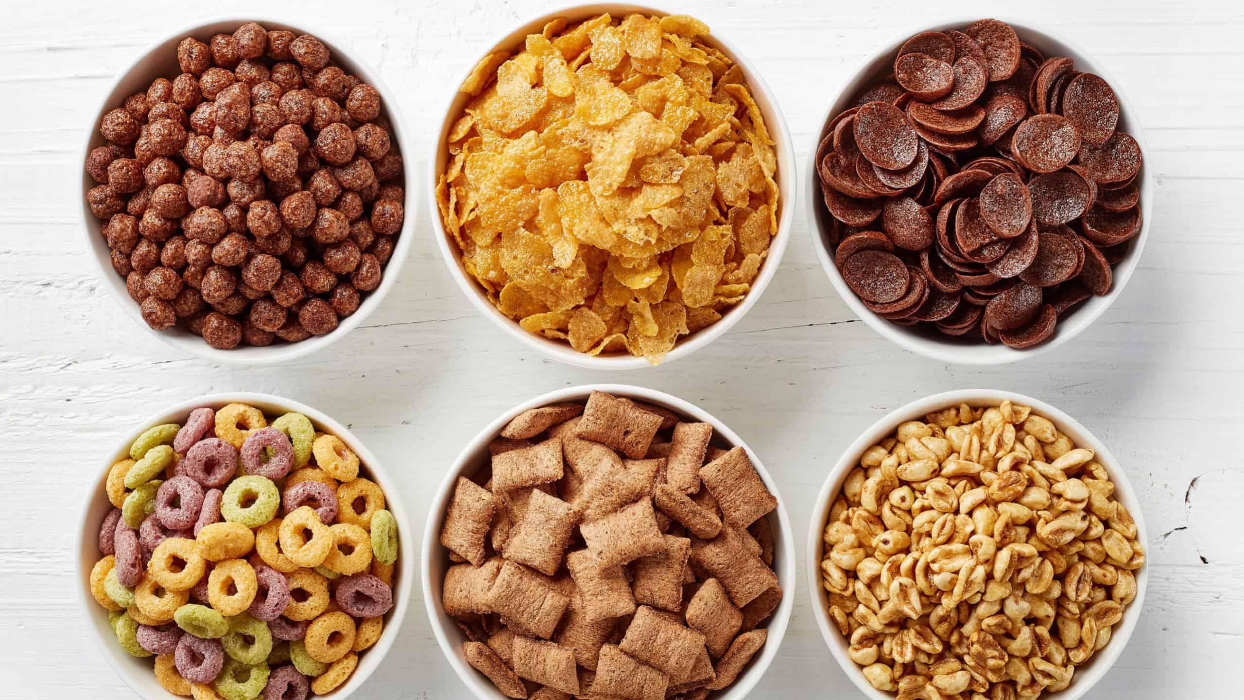 Bowls of various cereals from top view