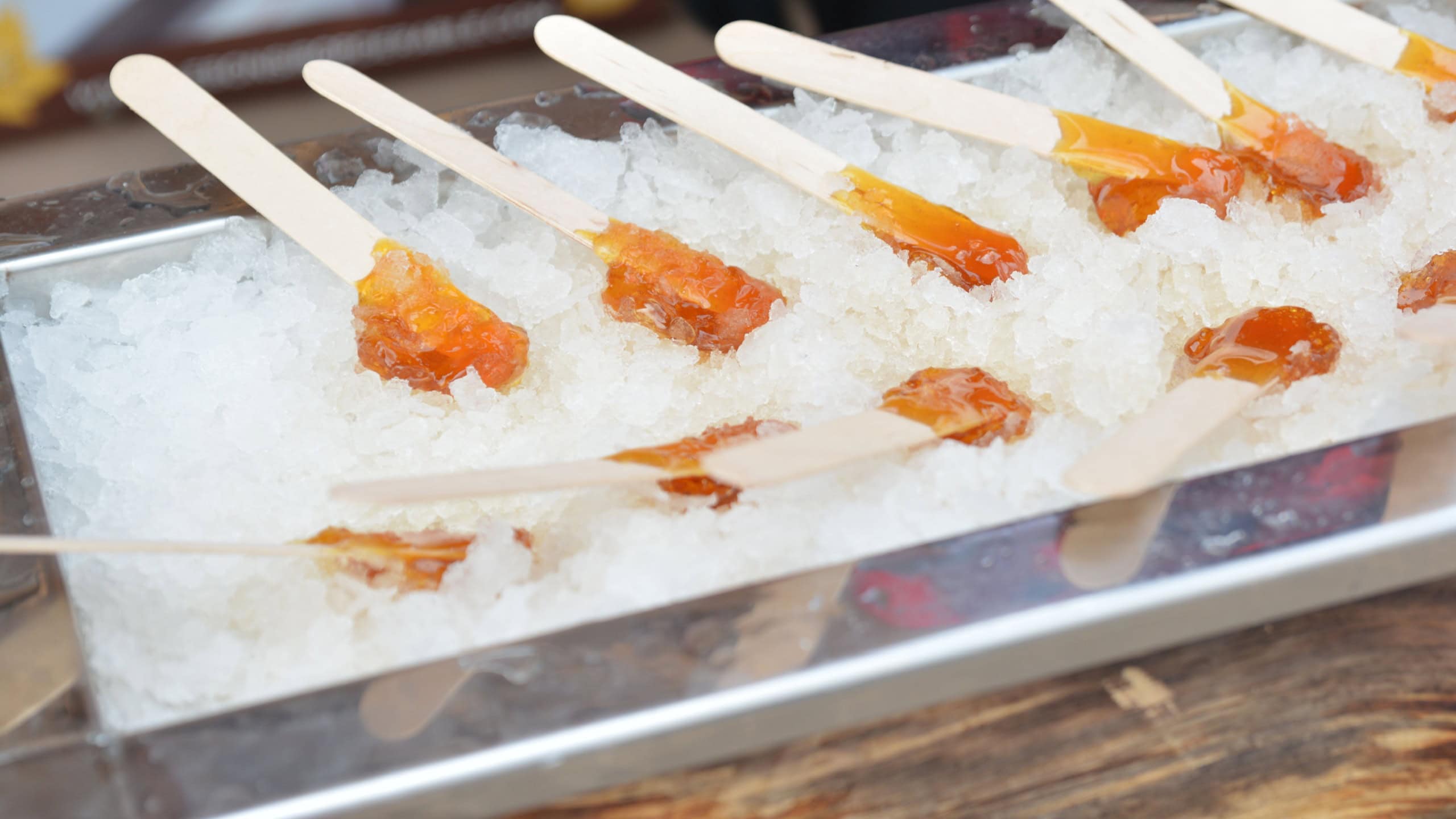 Making sugar on snow, or maple toffee at the sugar shack Canada.