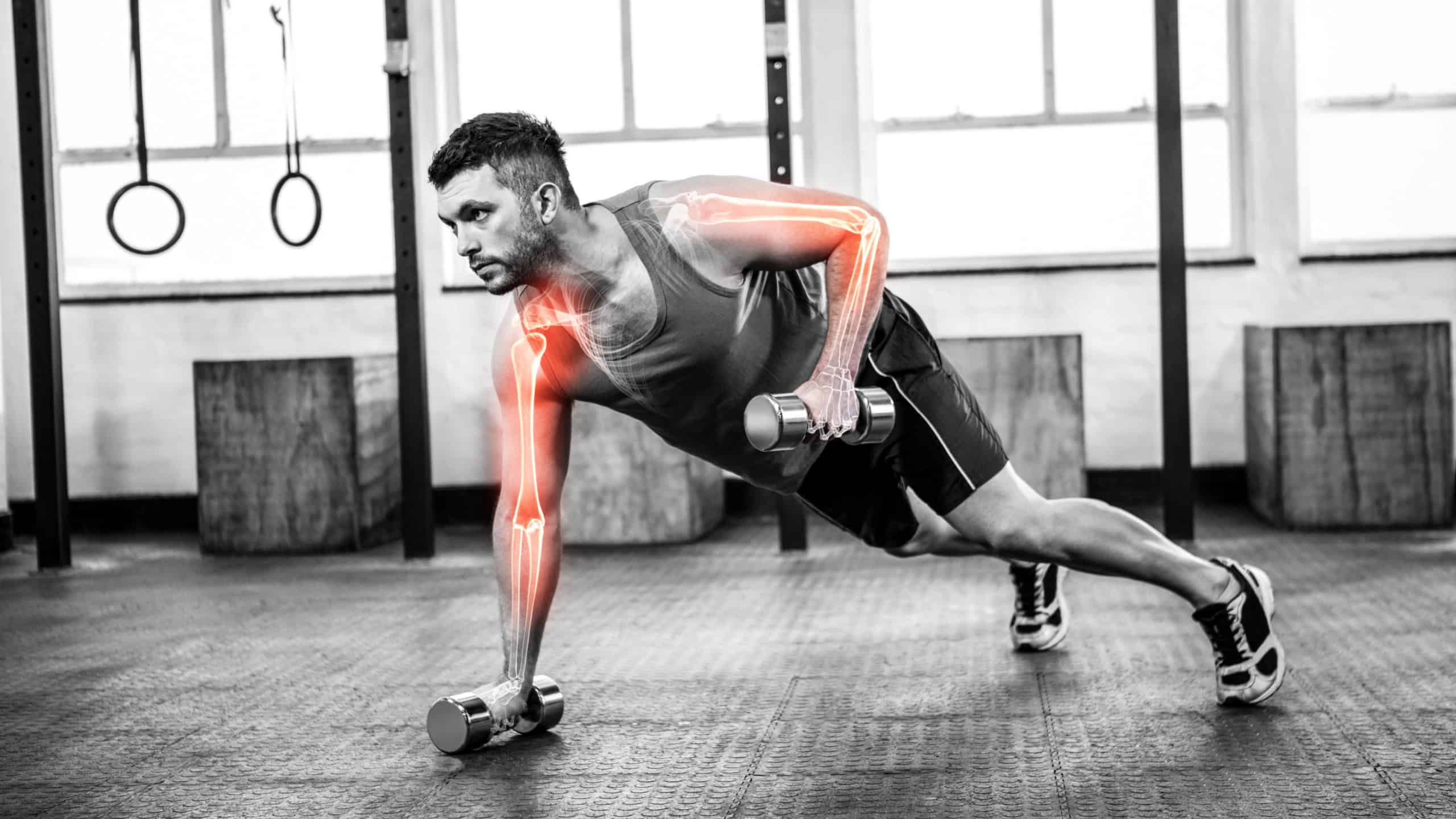 Digital composite of highlighted body of strong man lifting weights at gym