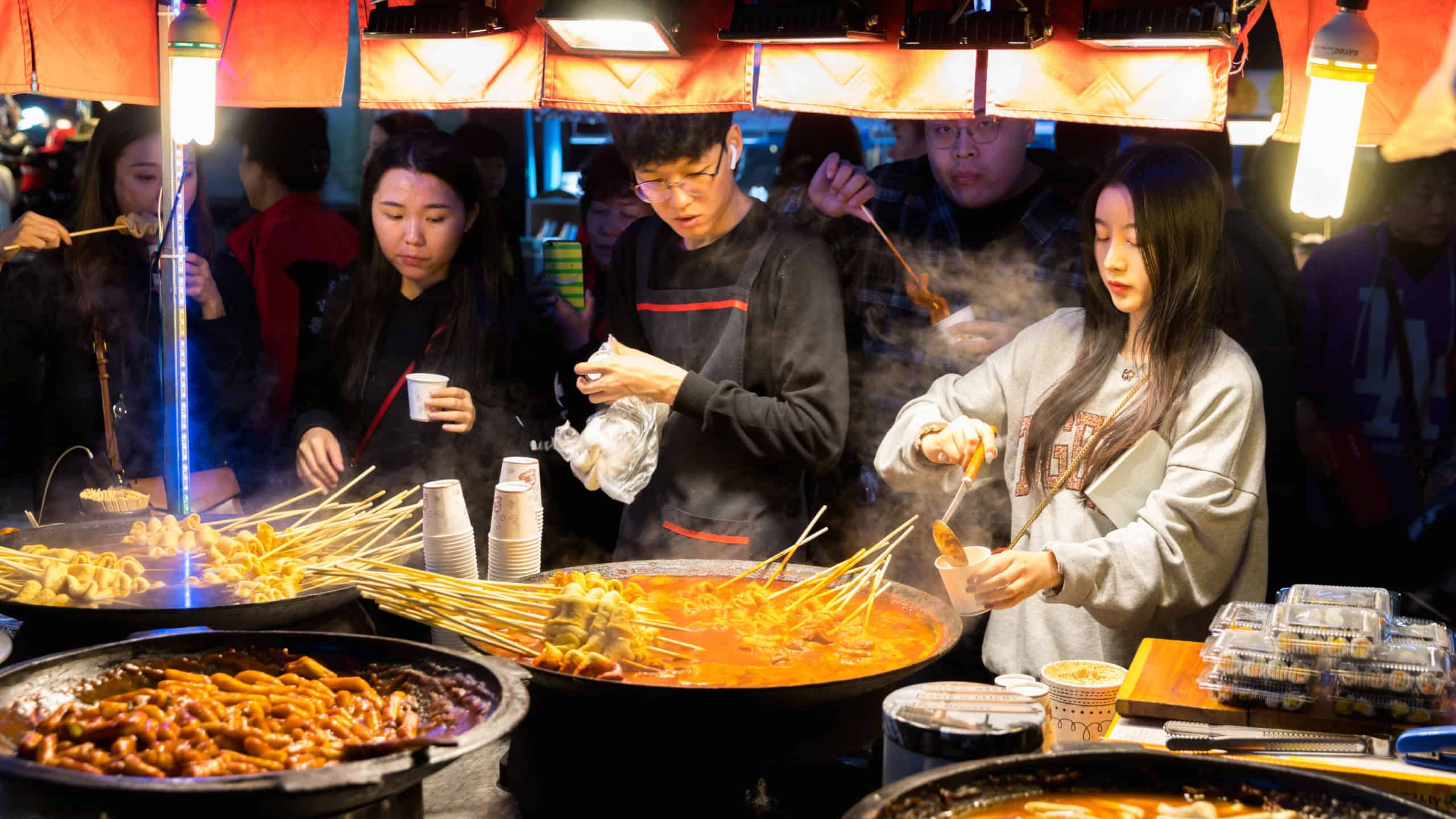 Seoul, Korea - October 22, 2018 : Stall with South Korea street food, Korea local food oden fish cake it is famous and spicy Soup in Myeongdong in Seoul, South Korea