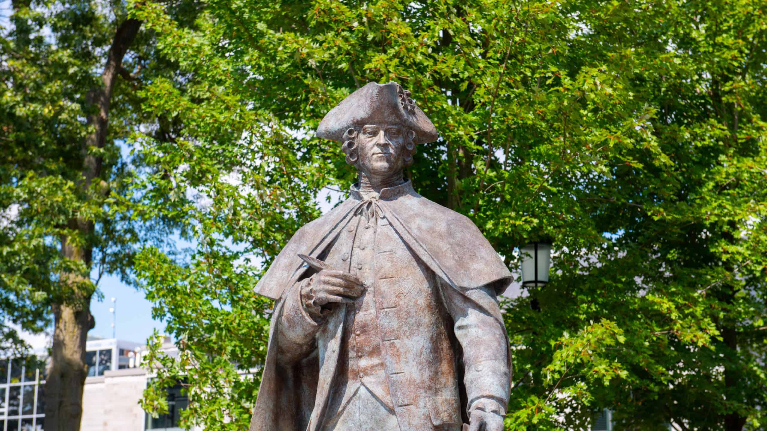 John Hancock statue at the Hancock Adams Green in Quincy Square in city center of Quincy, Massachusetts MA, USA. John Hancock was a founding father and signed the US Declaration of Independence.