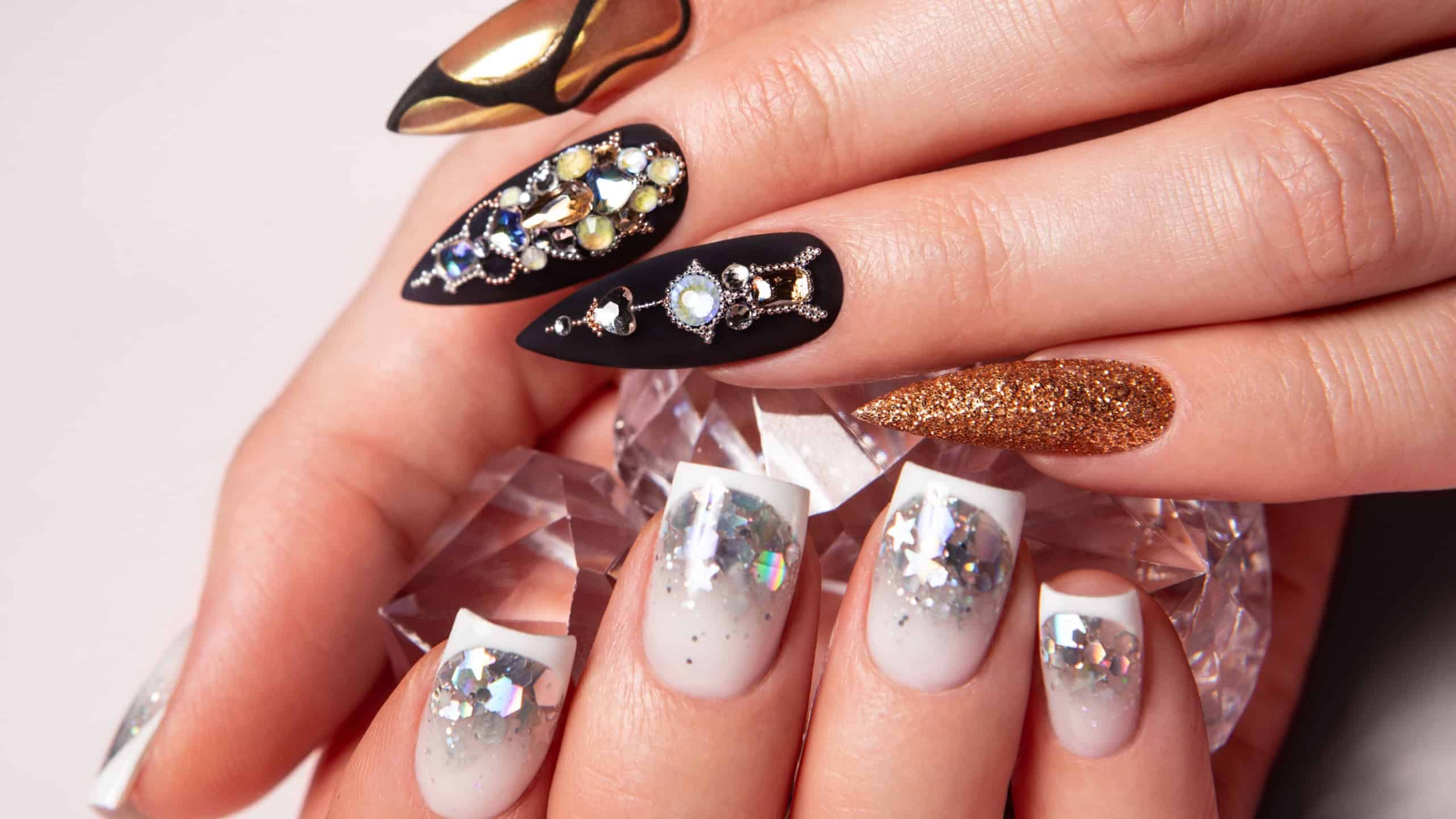 Two different manicures, black and white.