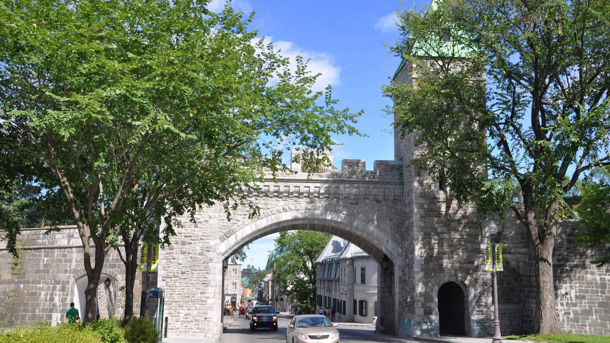 QUEBEC CITY, CANADA - SEP 10, 2011: St. Louis Gate in Quebec City, Canada. The wall surrounds most of Old Quebec, which was declared a World Heritage site by UNESCO in 1985.