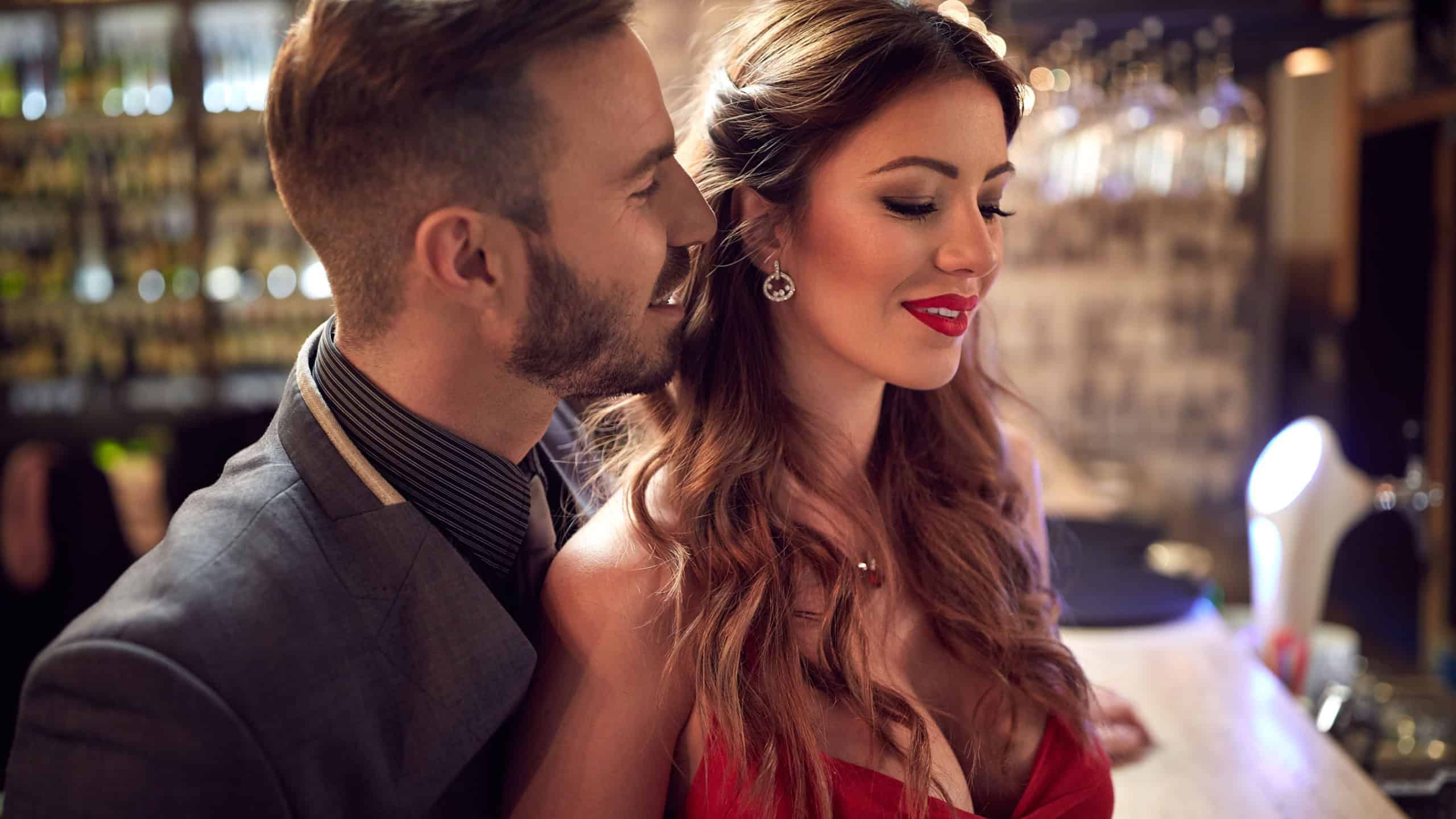 Attractive Caucasian couple flirting indoor