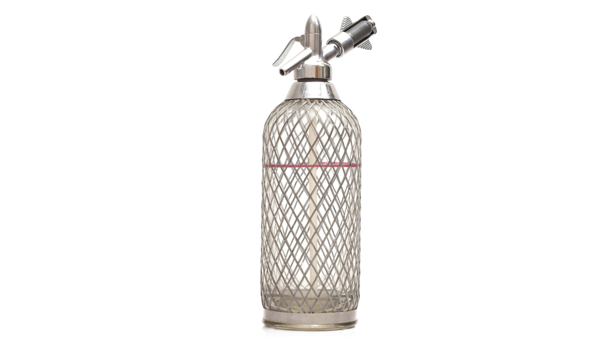 Old siphon bottle from the 1970's isolated on white background