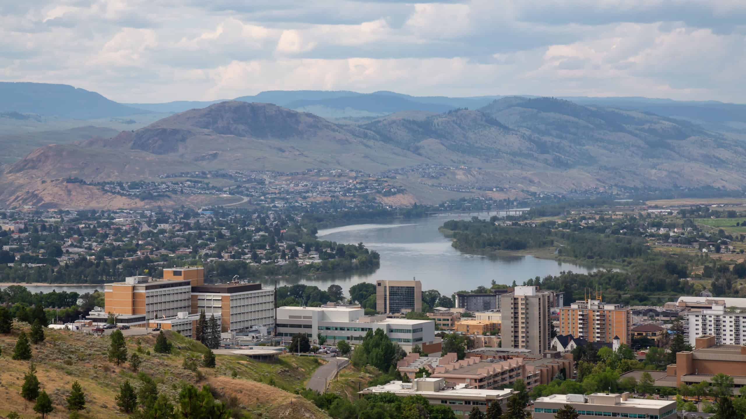 Aerial view of Kamloops City during a cloudy summer day. Located in Interior BC, Canada.
