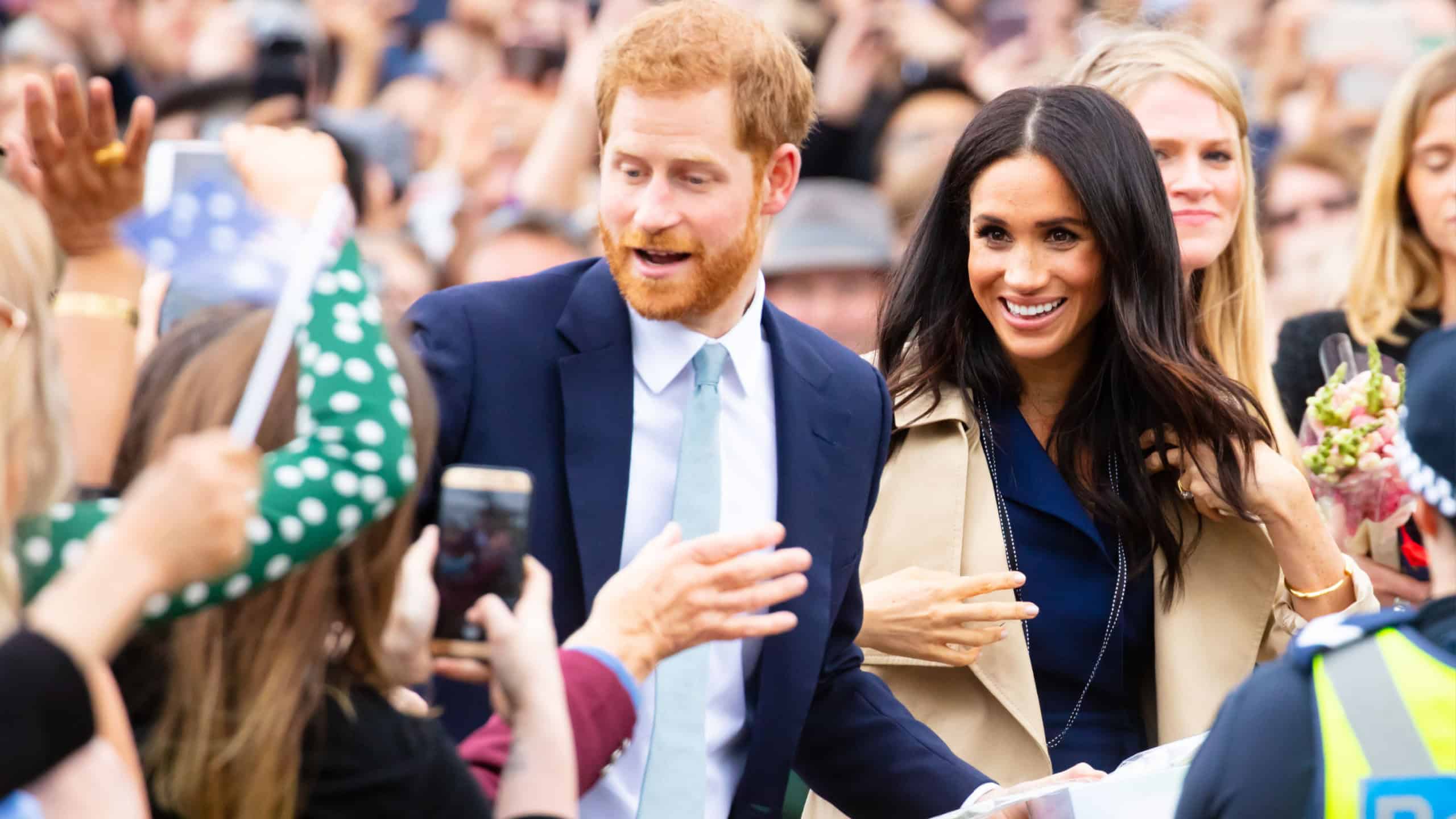 Prince Harry, Duke of Sussex and Meghan Markle, Duchess of Sussex meet fans at Government House in Melbourne, Australia