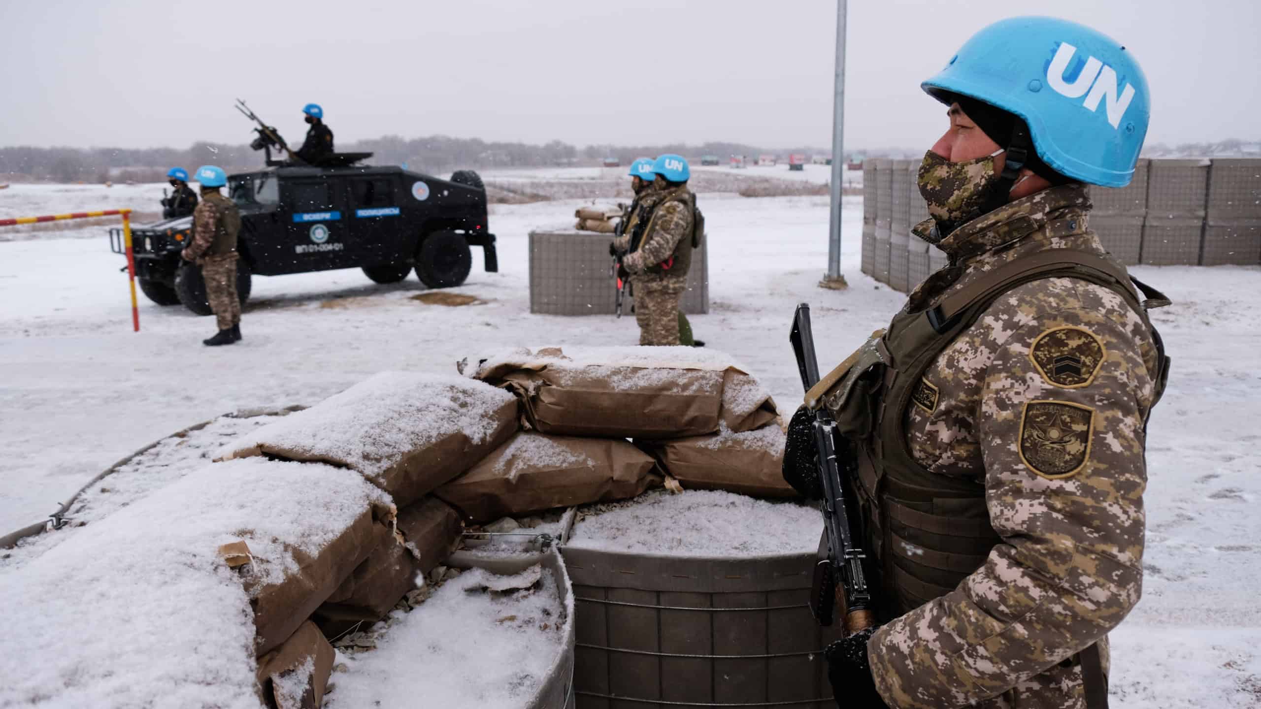 Soldiers guard the UN base. Conducting peacekeeping exercises in snowfall.