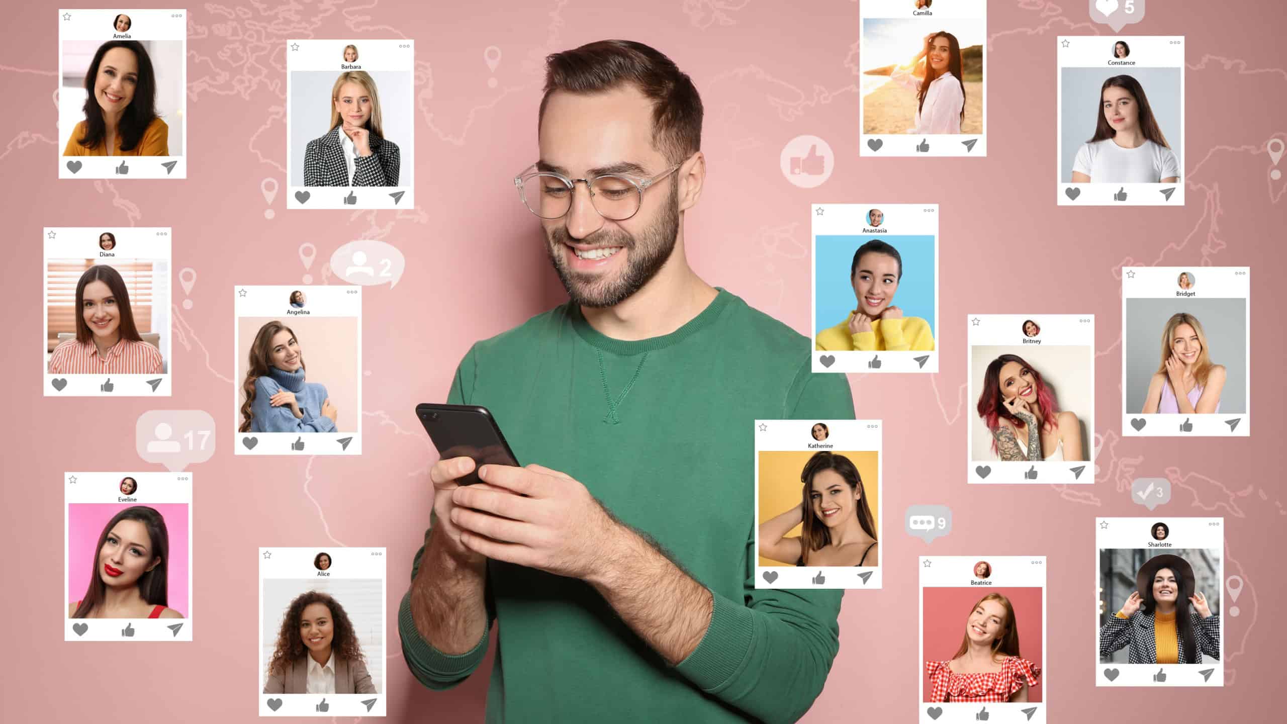 Handsome man visiting online dating site via smartphone on pink background