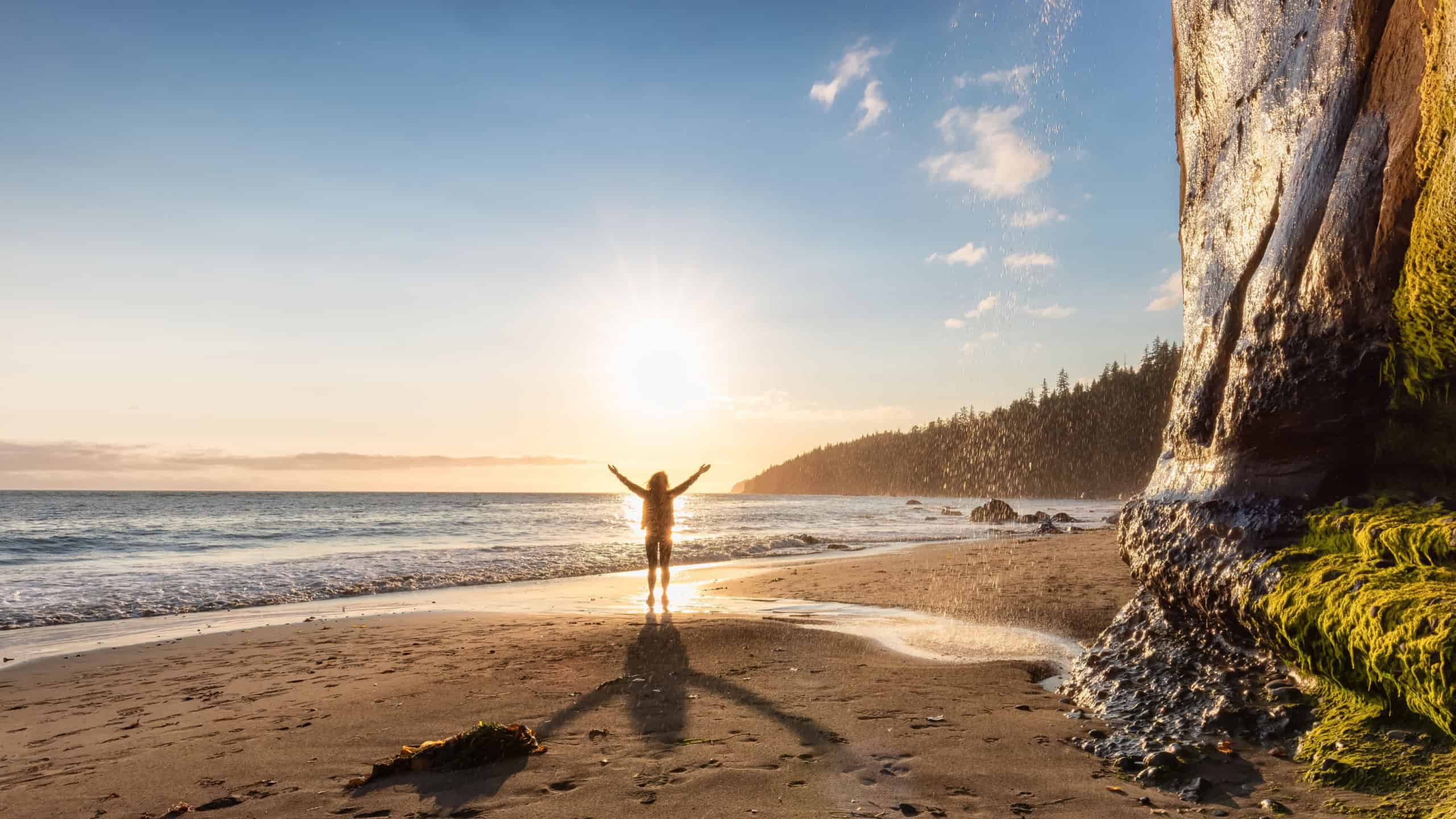 Adventurous Woman at Mystic Beach on the West Coast of Pacific Ocean. Summer Sunny Sunset. Canadian Nature Landscape Background. Located near Victoria, Vancouver Island, British Columbia, Canada.