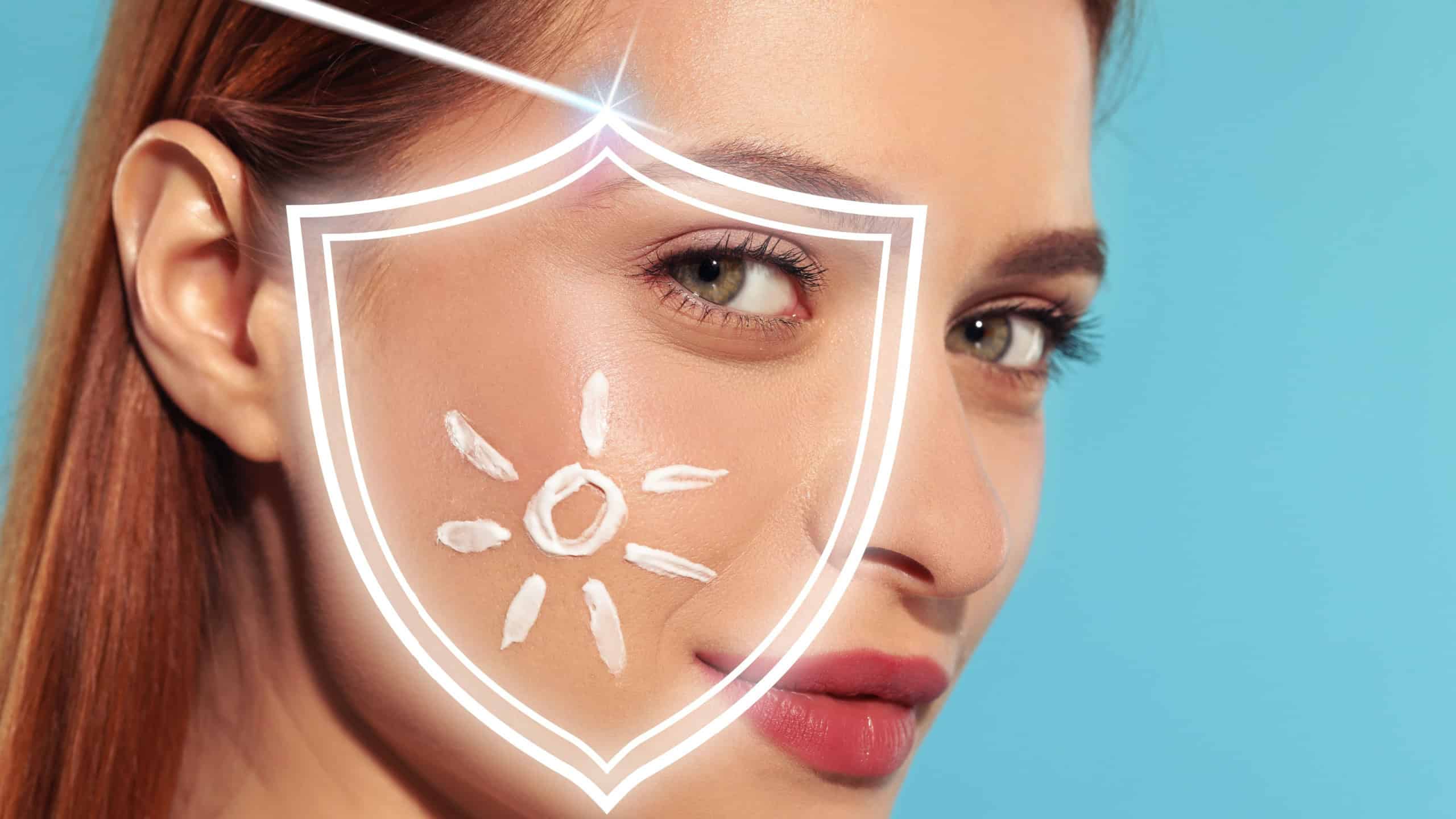 Sun protection care. Beautiful woman with sunscreen on face against light blue background, space for text. Illustration of shield as SPF