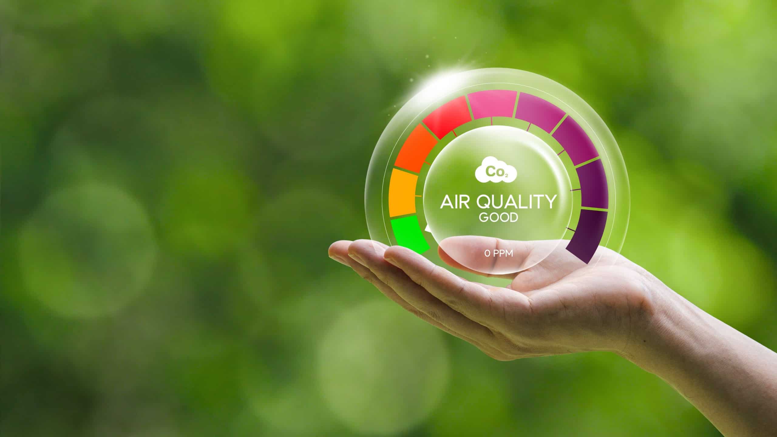Good air quality and clean outdoor air quality Safe from pollution, PM 2.5 dust, pure natural atmosphere concept. hand with air bubbles, prevention of pollution, dust, bad air
