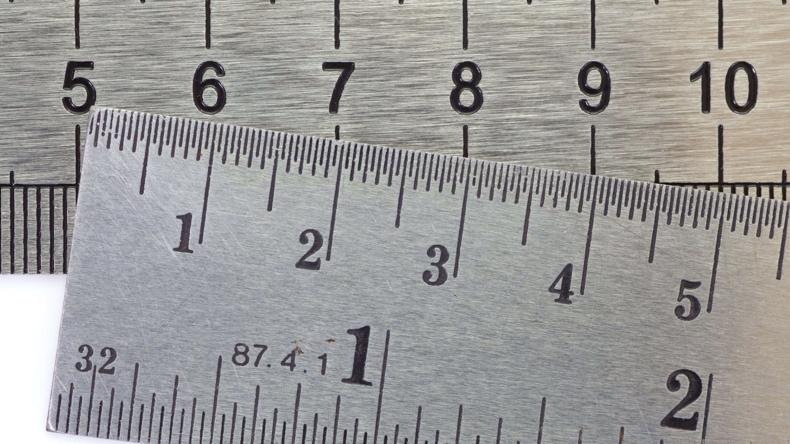 Stainless steel ruler isolated on white background