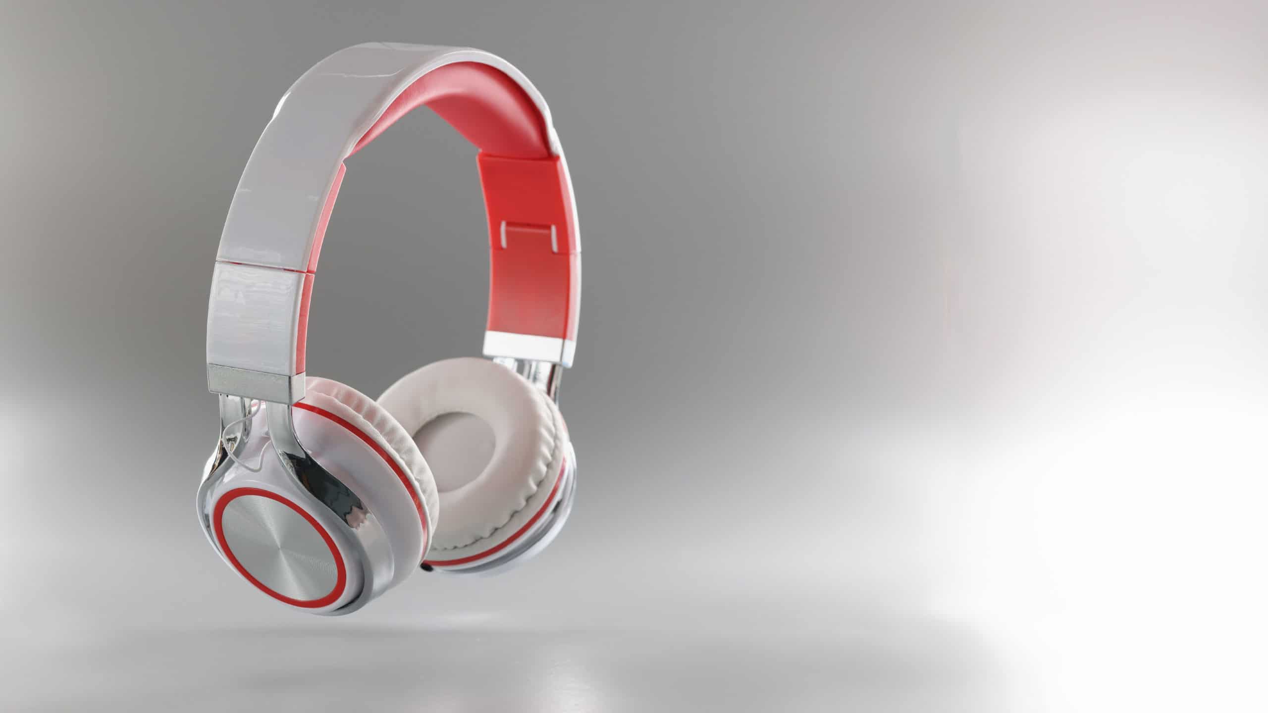 Gray bluetooth wireless headphones, close-up. Stylish accessory for listening to music. Clear sound headphone