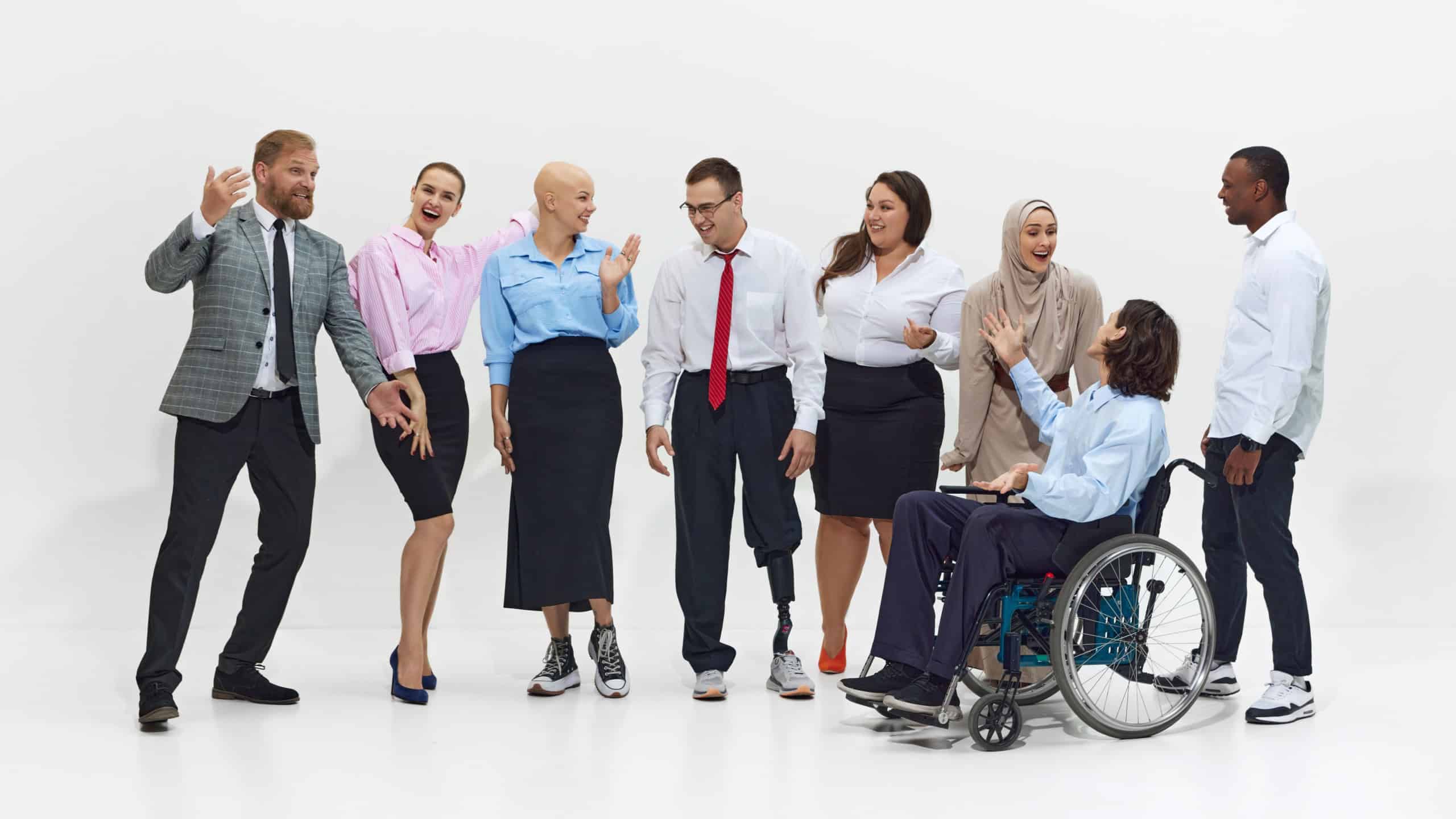 Lively group of diverse people, colleagues engage in animated conversation, with visible enthusiasm, showing inclusion and acceptance in the workplace. Concept of business, dei, equality, support