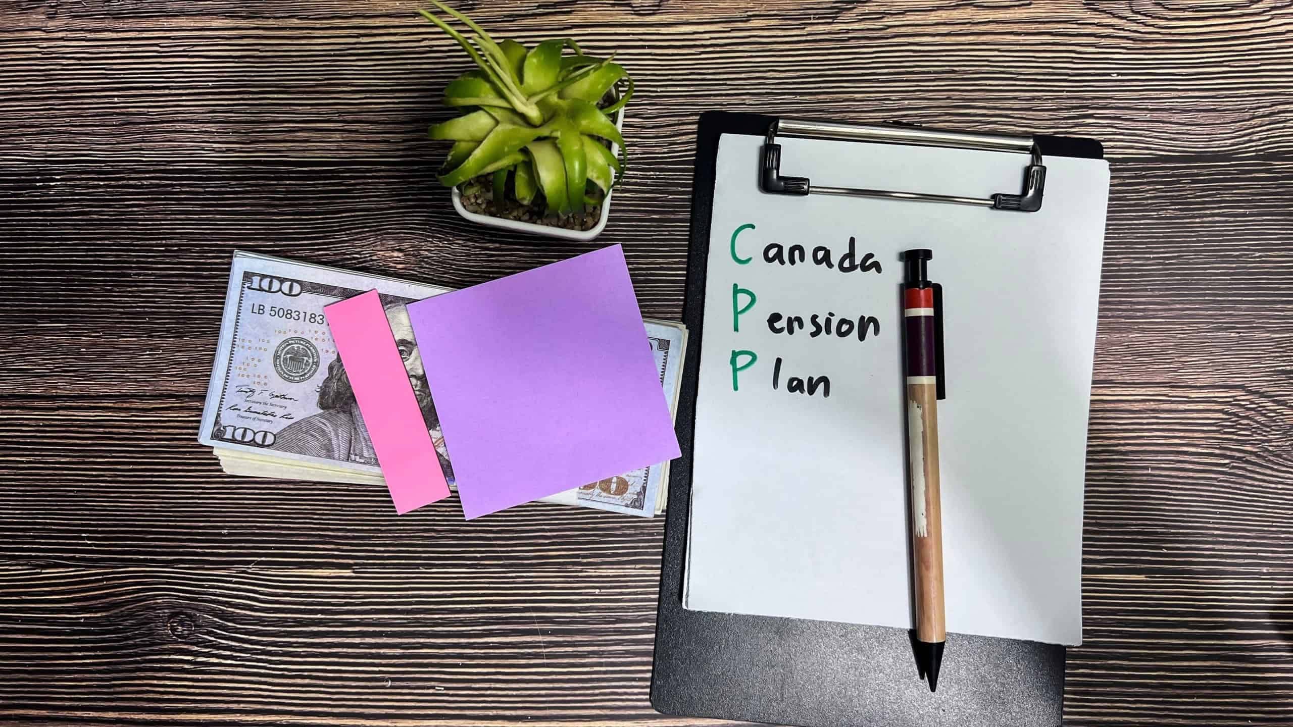 Concept of Canada Pension Plan write on paperwork isolated on Wooden Table.