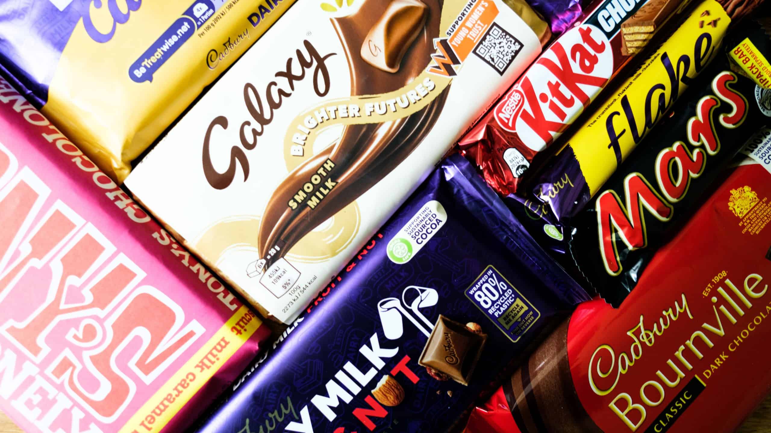London UK, May 09 2025, Selection Of Popular British Chocolate Bars Cadbury, Galaxy, Bourneville, Tonys, Nestle, Kit Kay, Mars, Flake