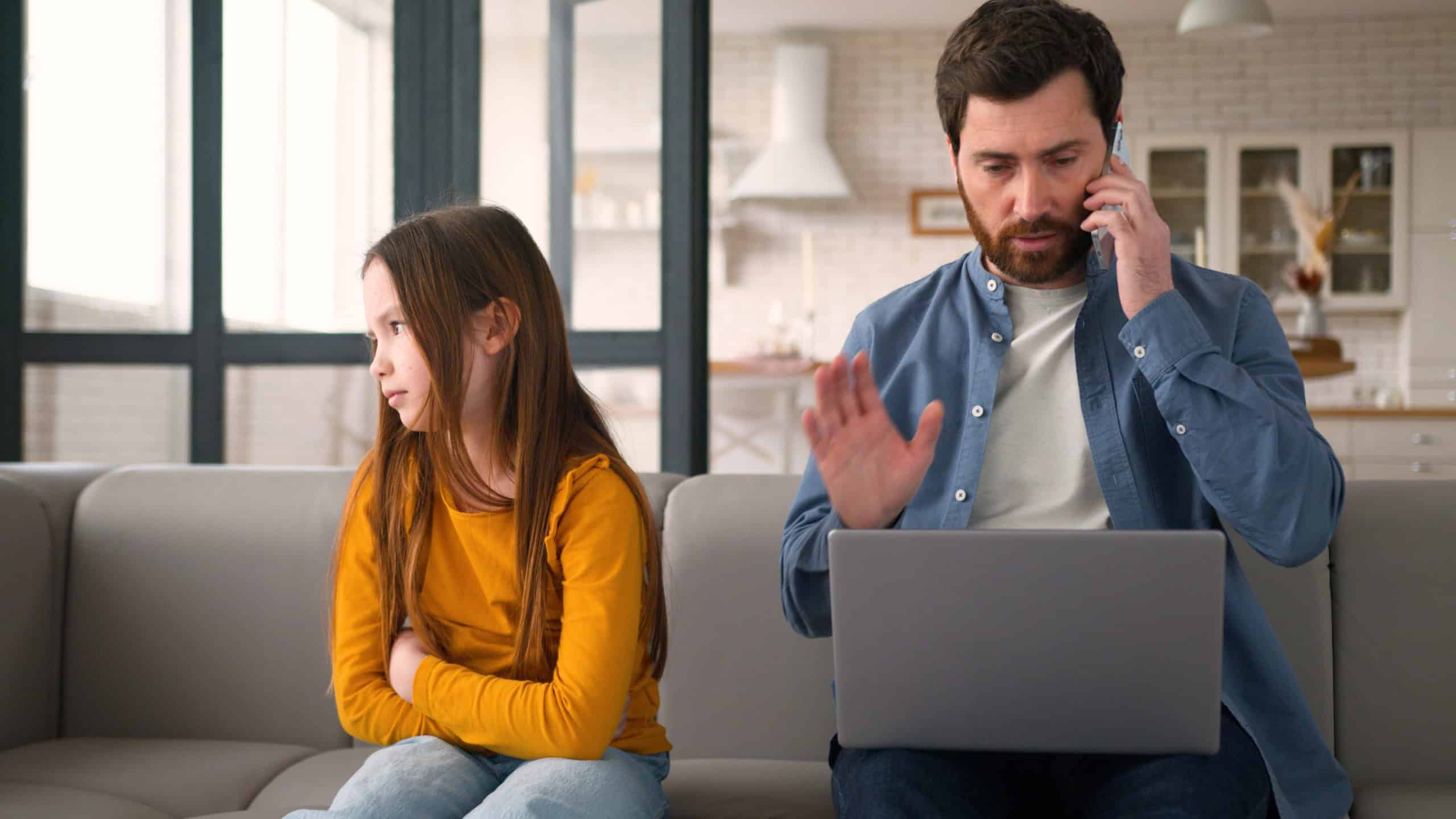 Noisy Caucasian girl kid schoolgirl need attention bad behavior mischievous little child laugh male parent man speaking mobile phone dad guy work laptop freelance father ignore daughter at home family