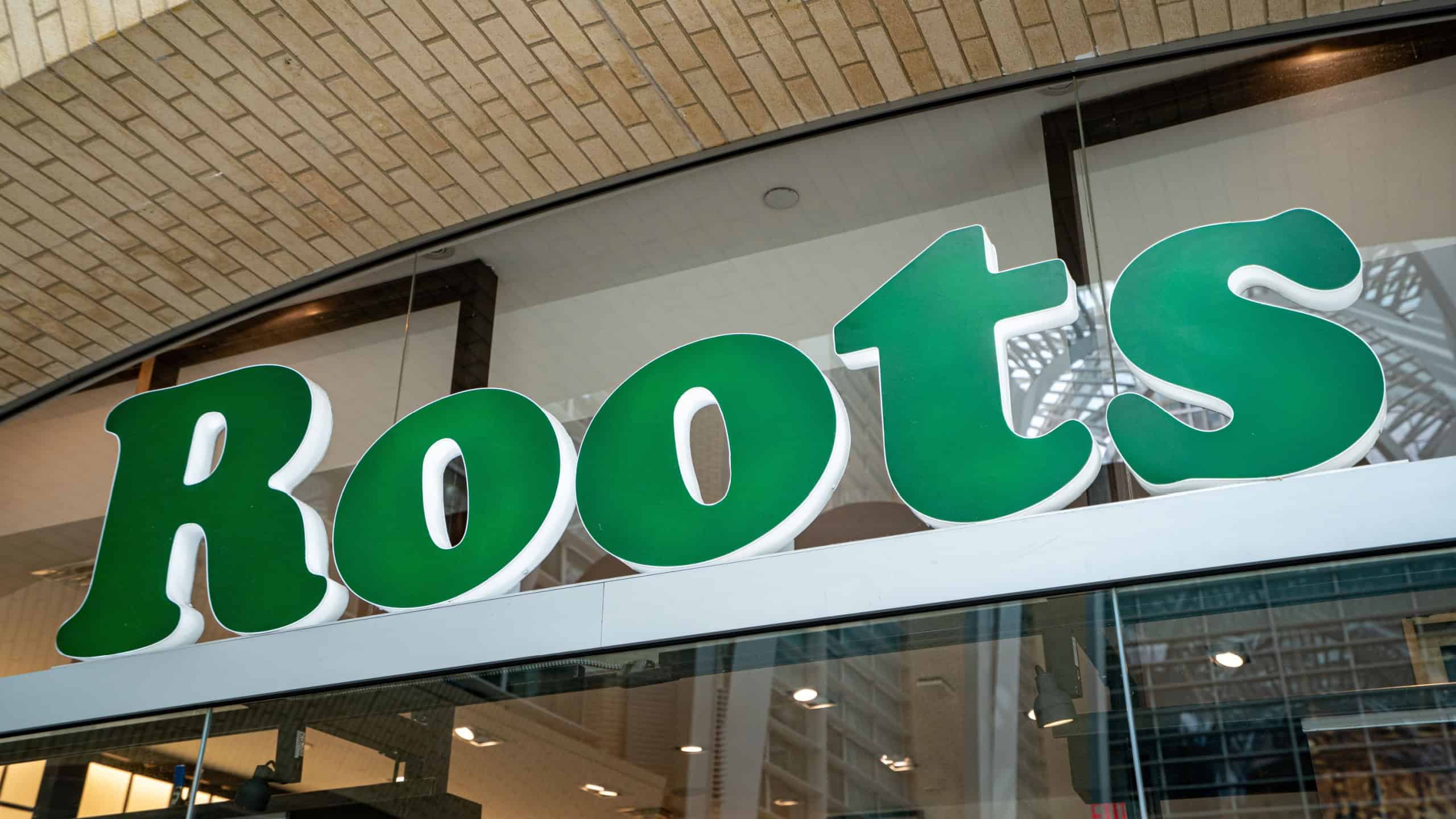 View of Roots store sign. Toronto, Canada - August 13, 2025.