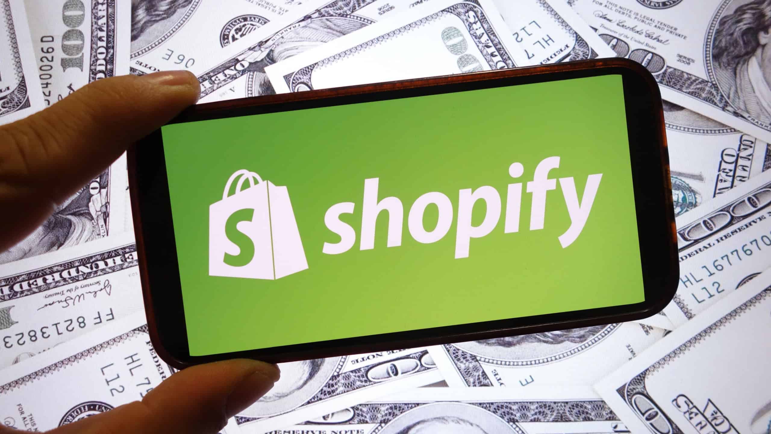 Shopify company logo displayed on mobile phone