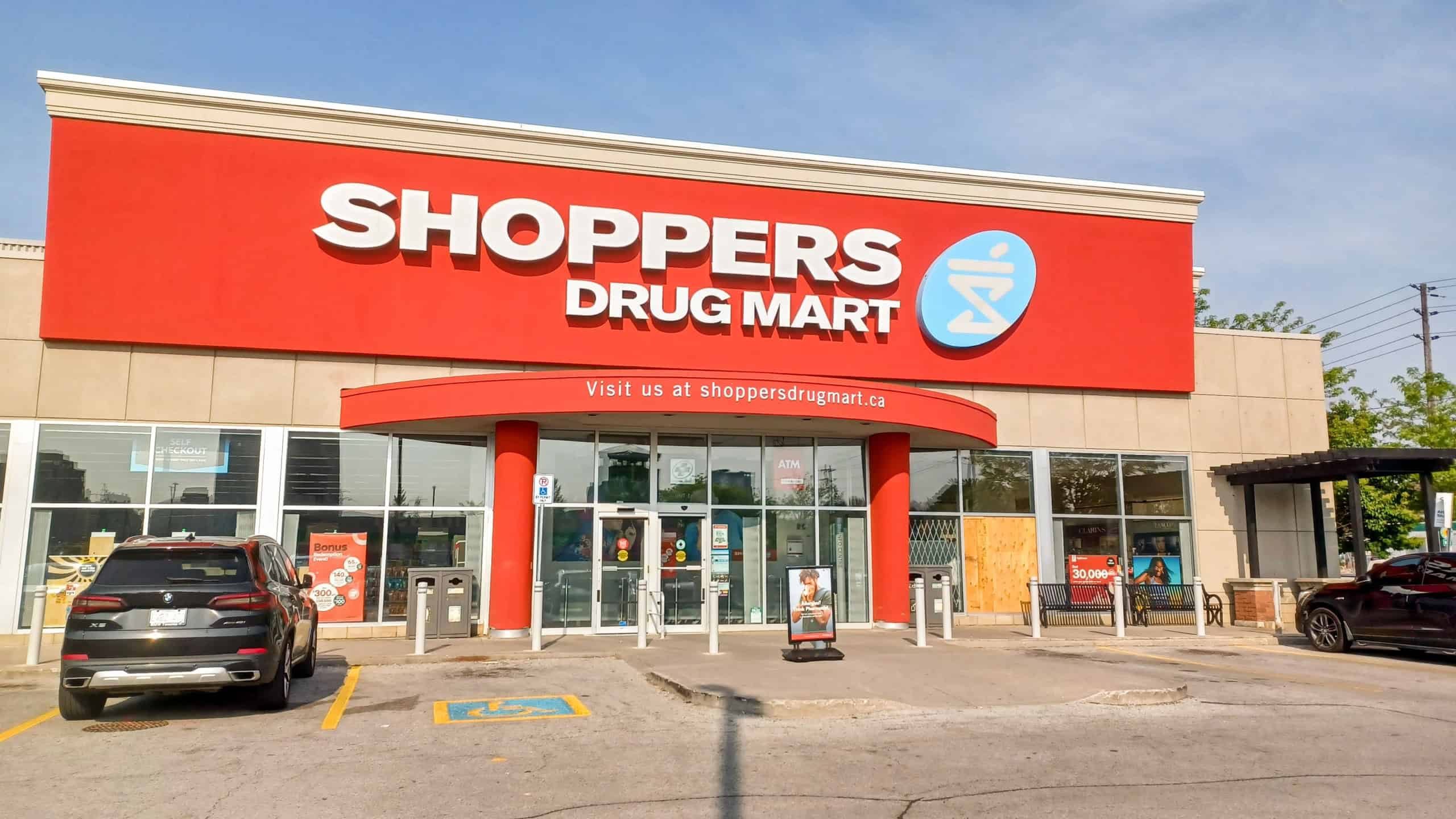 The logo and brand sign of Shoppers Drug Mart Store in Toronto, Canada.
