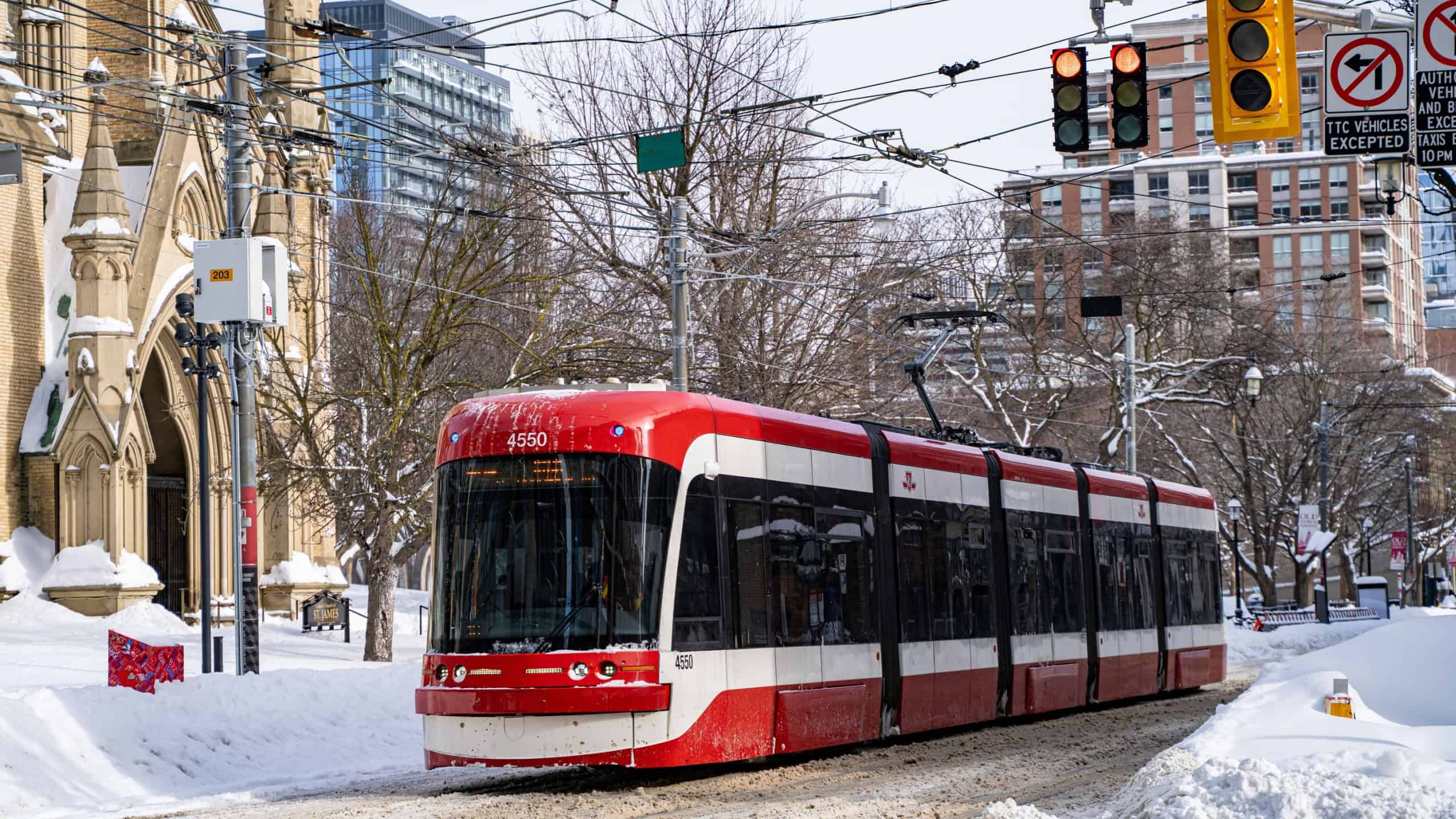 View of a TTC streetcar on a snowy city street. Toronto, Canada - January 26, 2026.