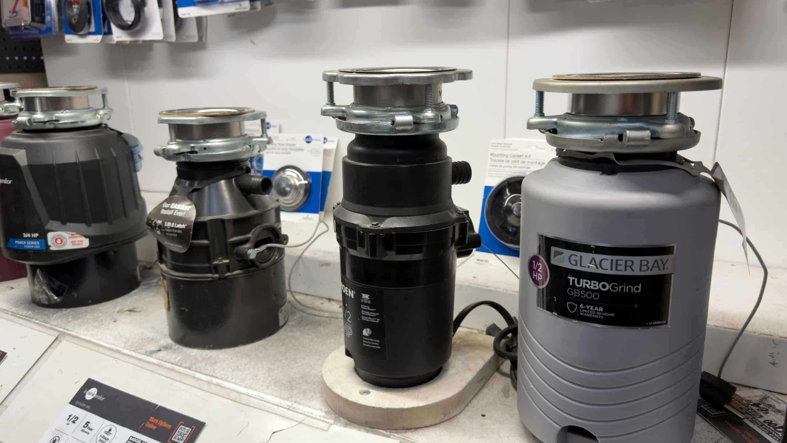 Kitchen Garbage Disposal Units Displayed on Retail Store Counter