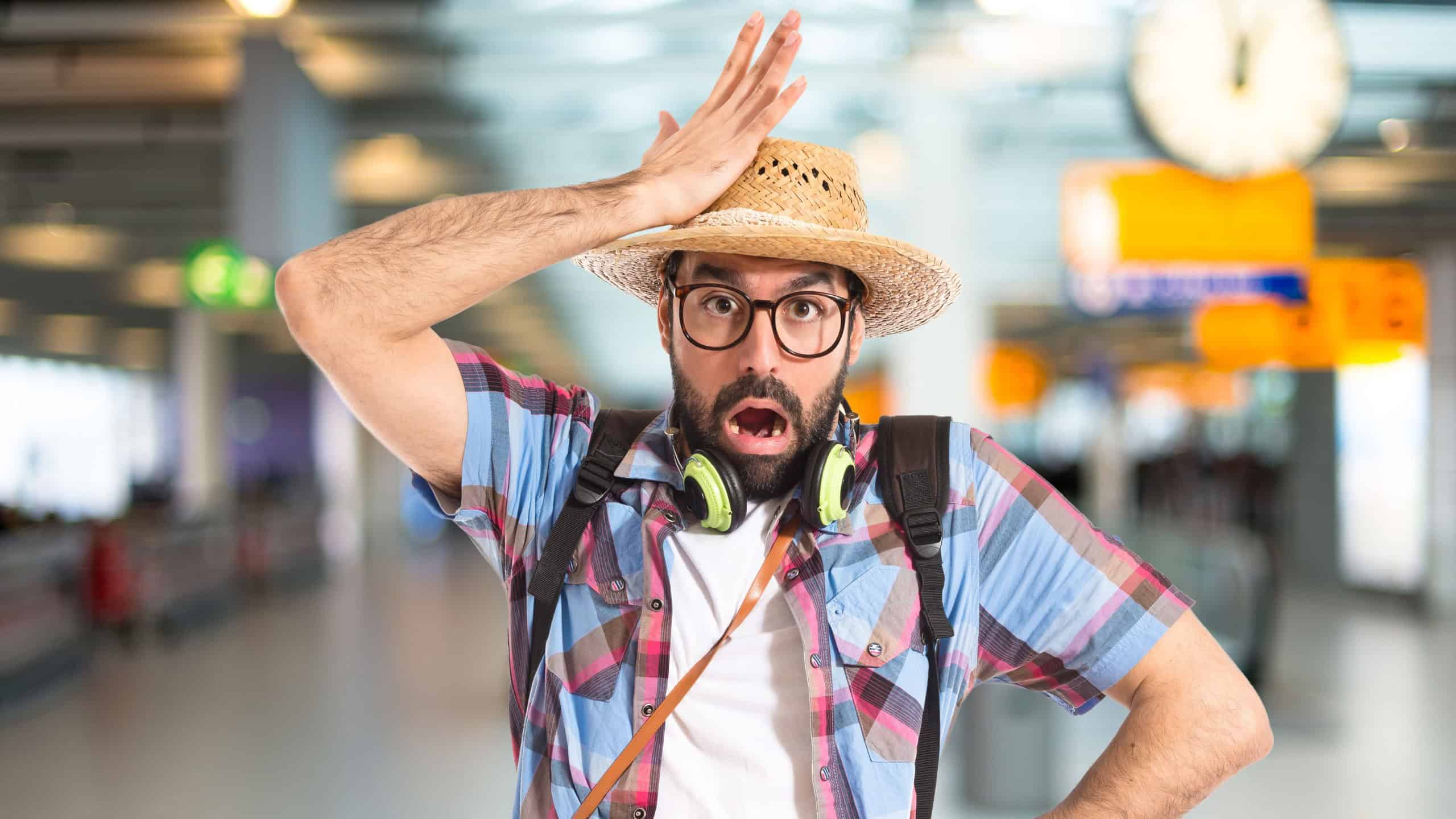 Tourist doing surprise gesture on unfocused background
