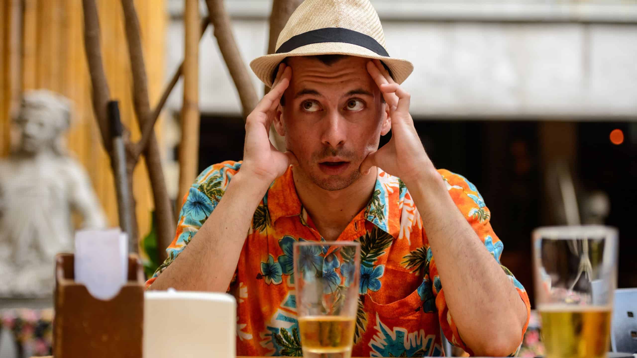 Stressed tourist man