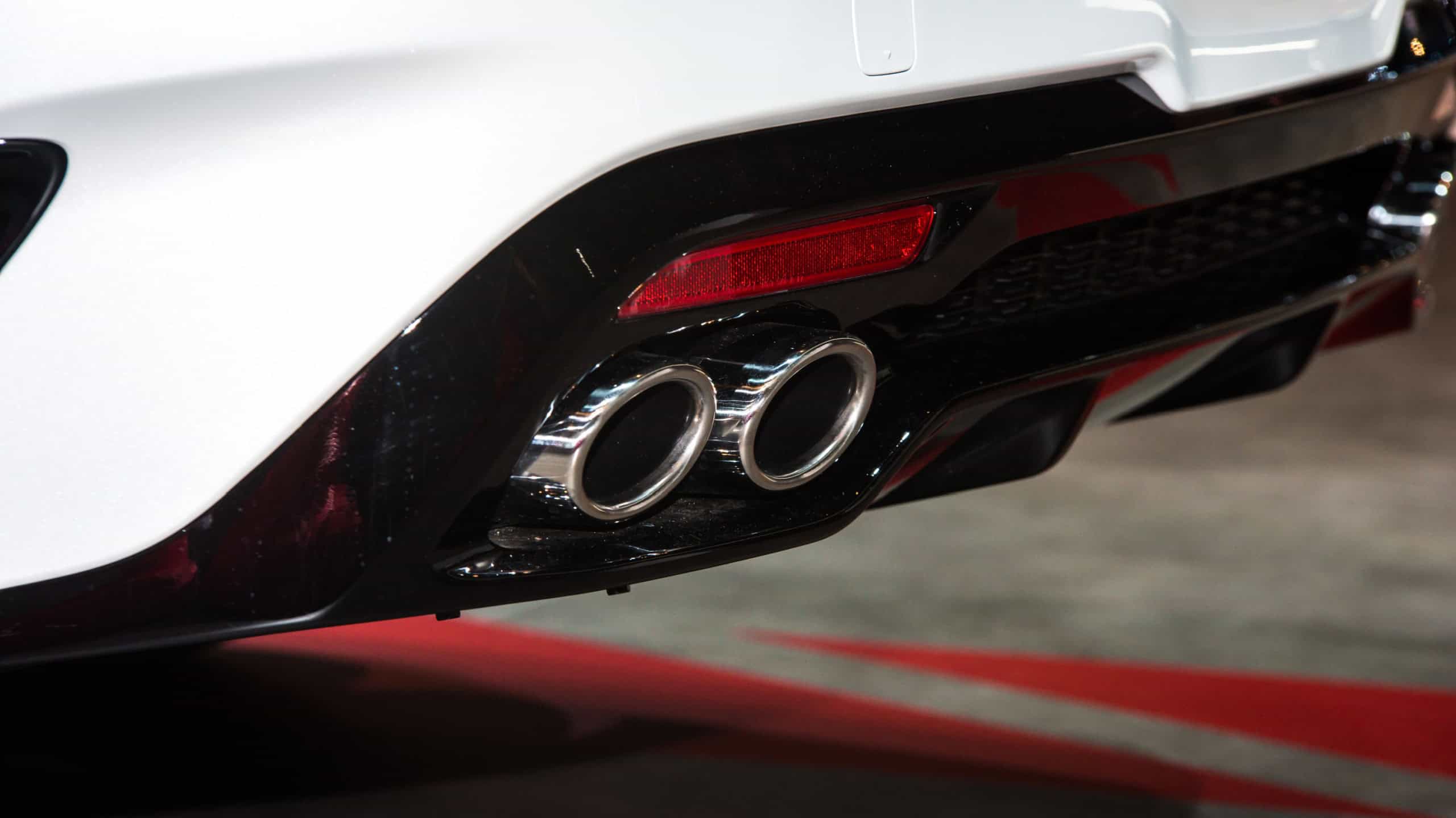 Clean exhaust pipe of new modern car