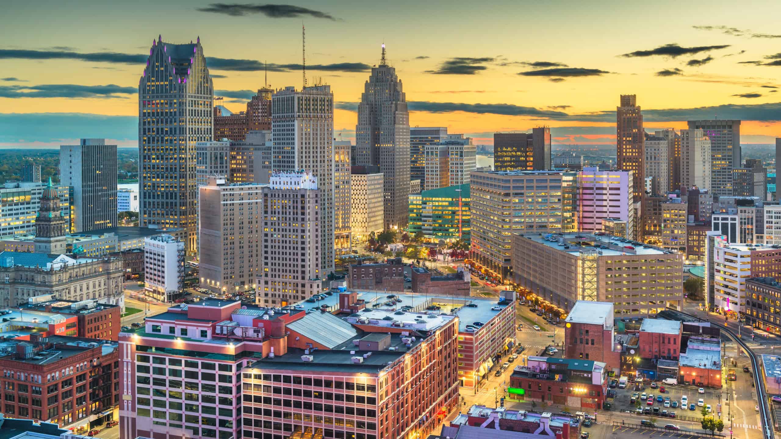 Detroit, Michigan, USA downtown skyline from above at dusk.