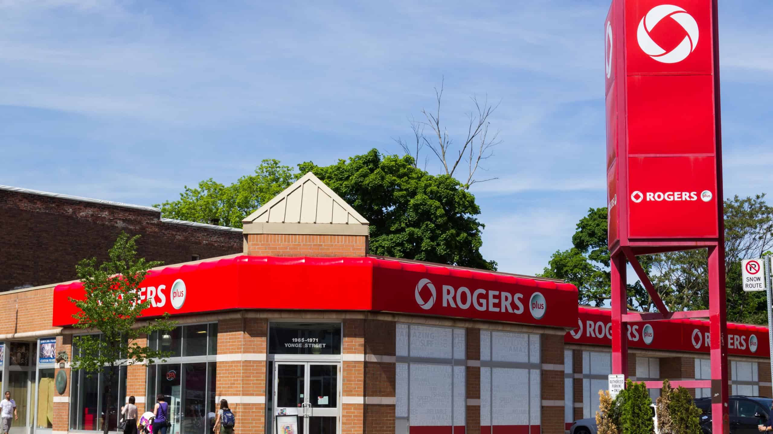 TORONTO, CANADA - JUNE 6 2014: The outside of a Rogers Store in central Toronto. People can be seen outside the store