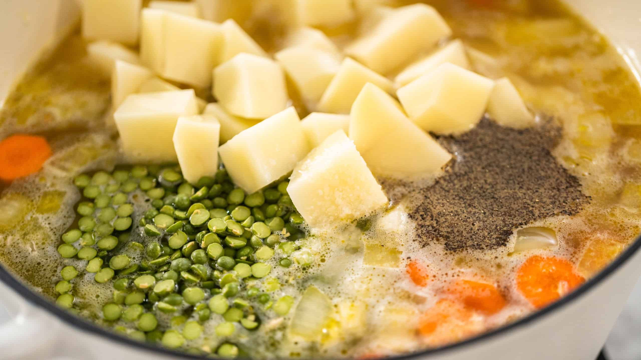Cooking split pea soup in enameled cast iron dutch oven.