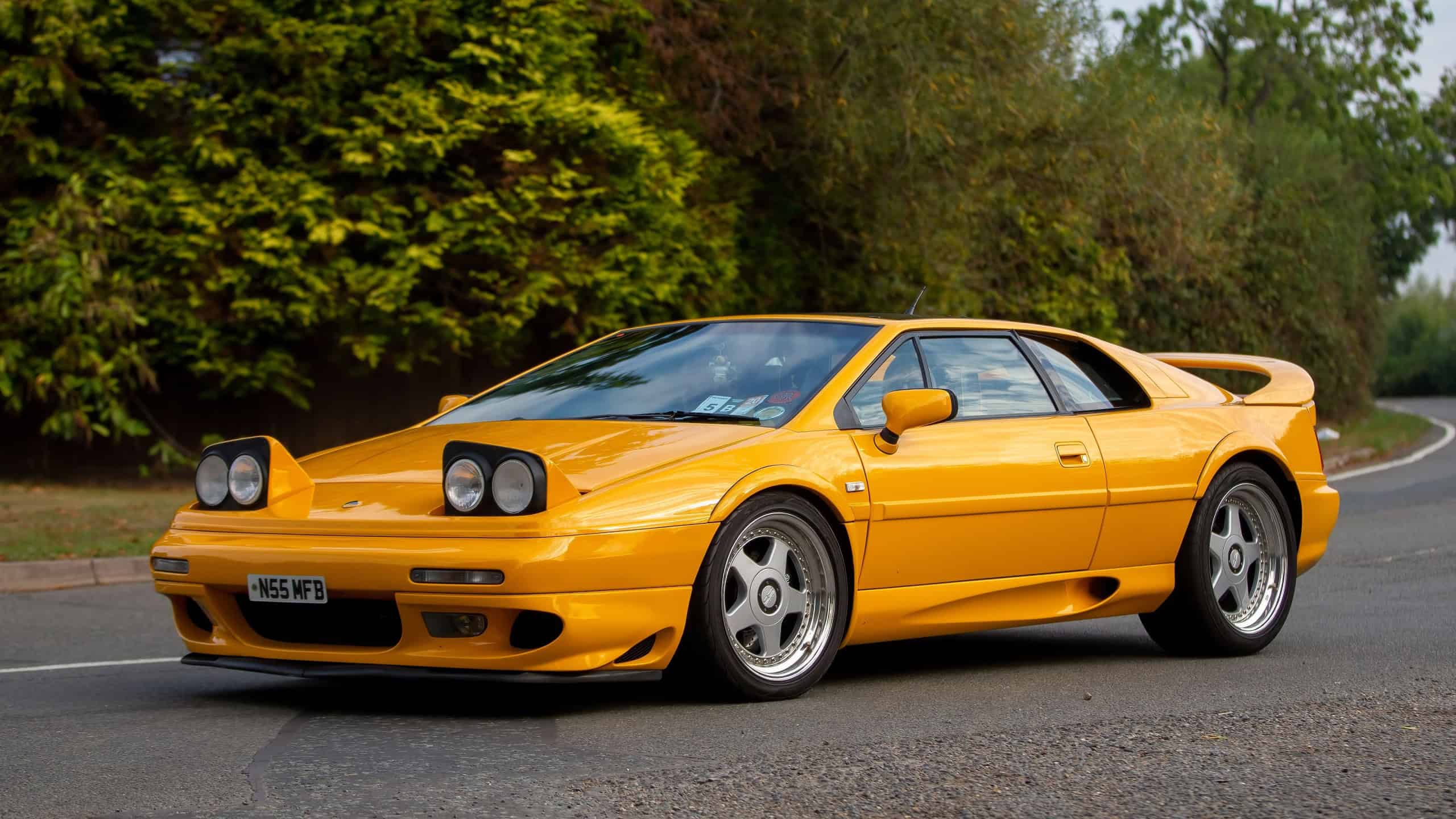 Whittlebury,Northants,UK - August 27th 2022. 1996 Lotus Esprit V8 Turbo with pop up headlights driving on an English country road