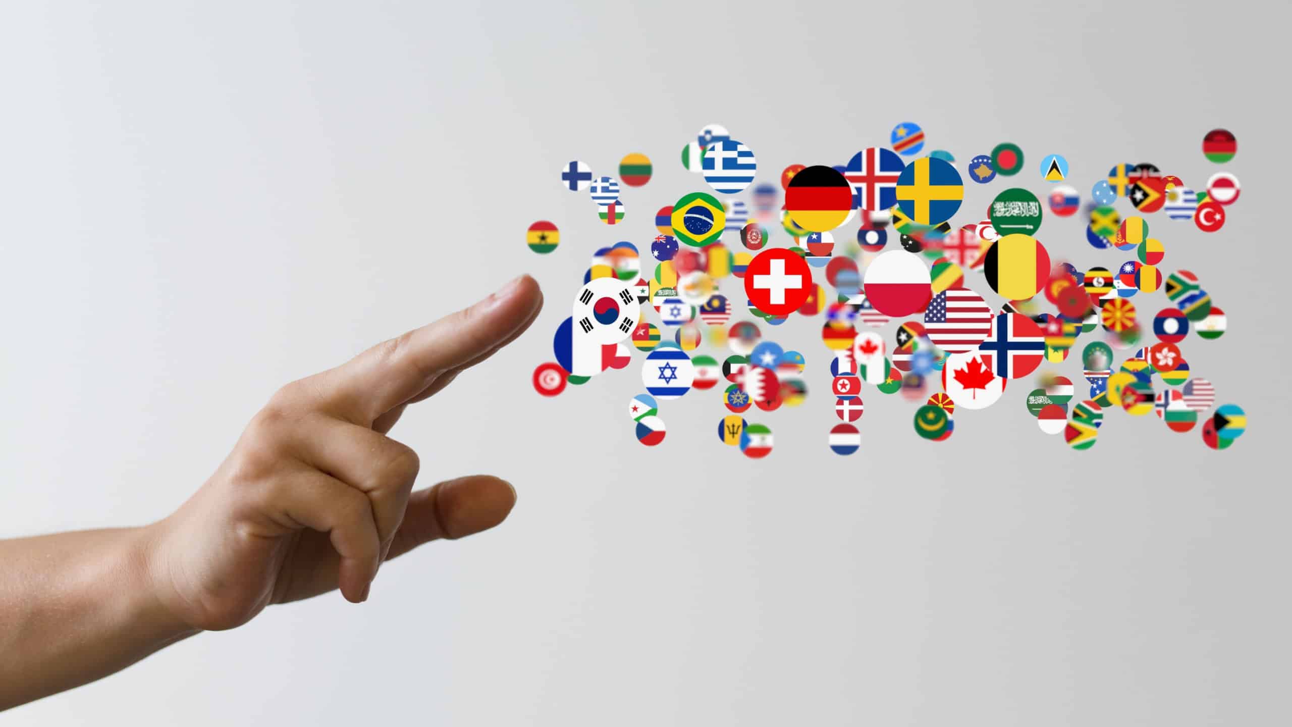 A person presenting a virtual projection of different country flags