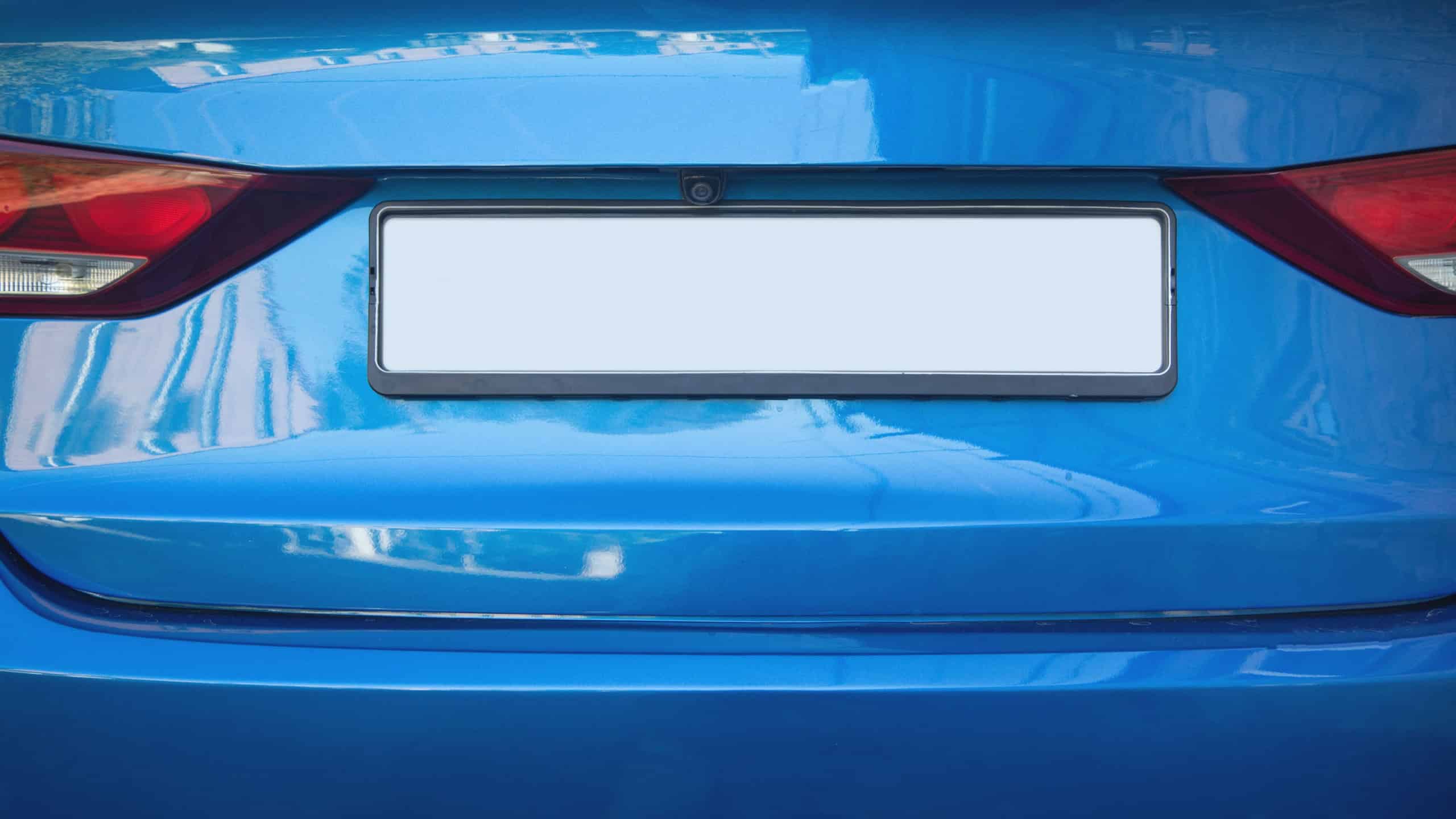 Empty vehicle registration plate on a car.