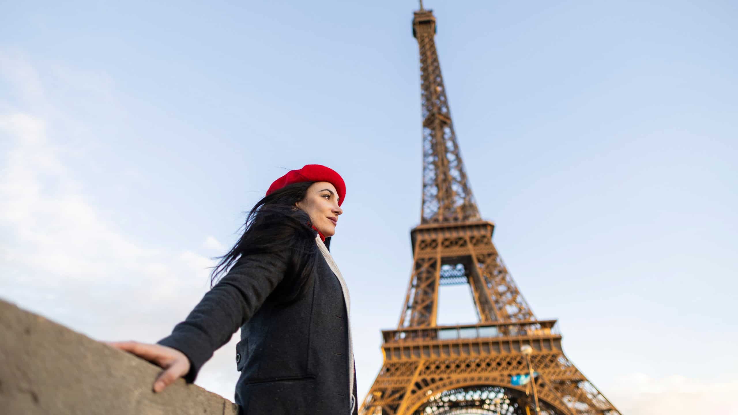 Woman in Red Beret Enjoying the Eiffel Tower View