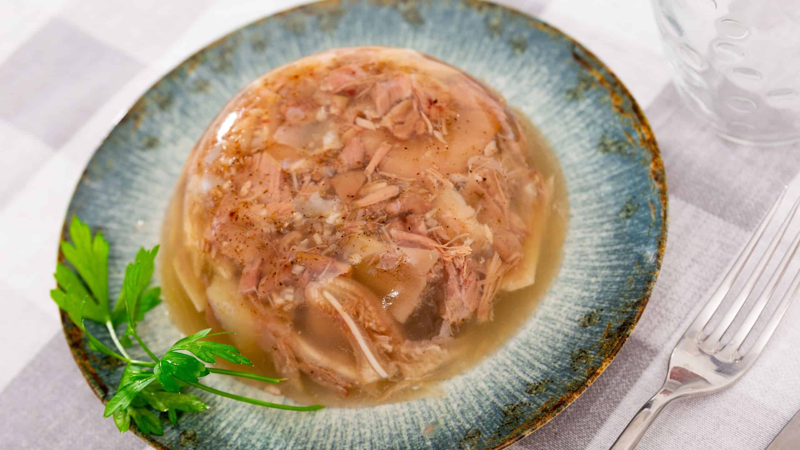 Bowl of pork aspic, meat jelly, popular appetizer in western Europe