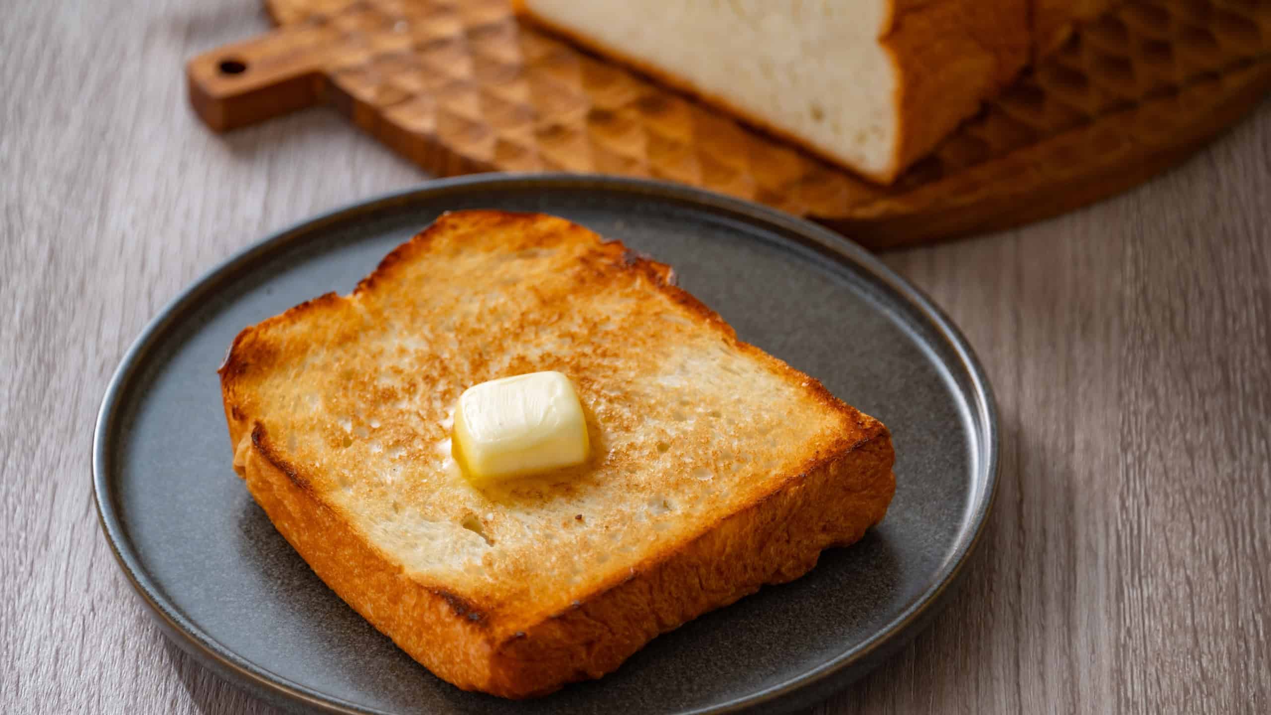 Buttered toast and white bread. Delicious white bread image.