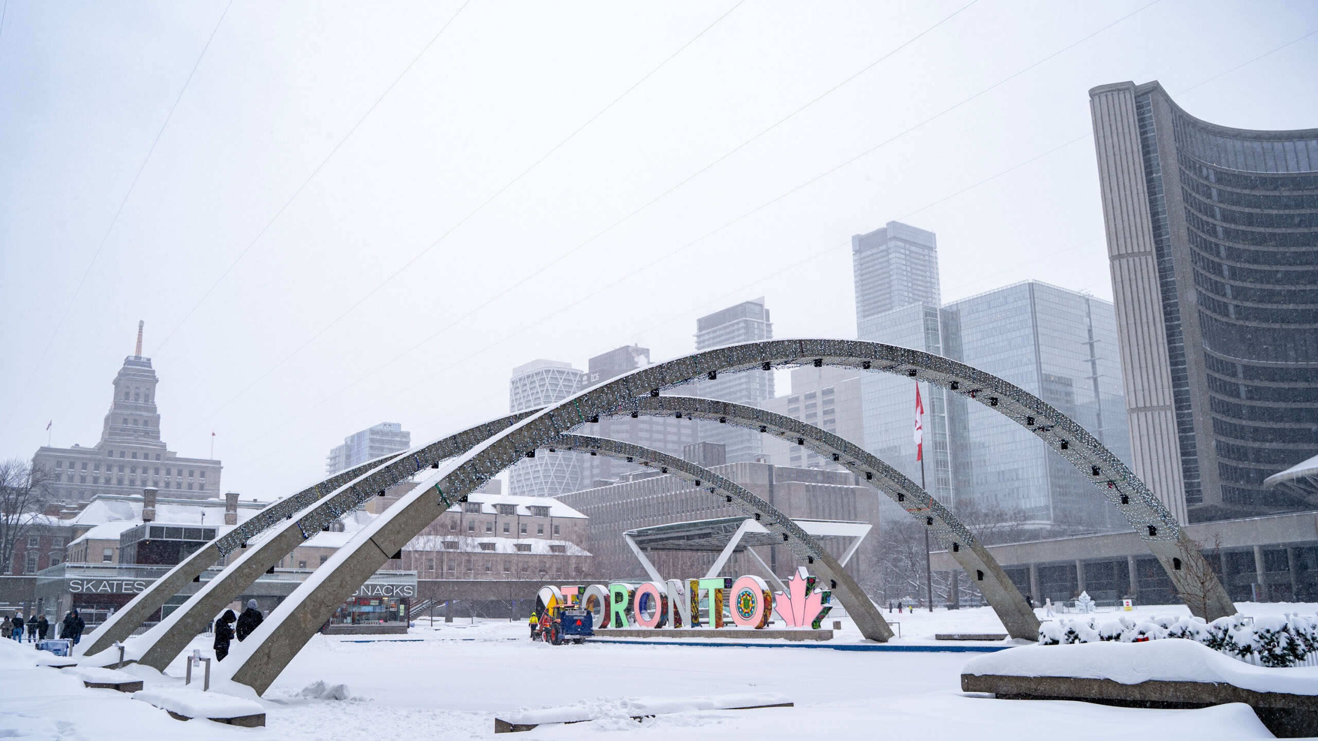 Winter storm view of Nathan Phillips Square in downtown Toronto. Toronto, Canada - February 16, 2025.