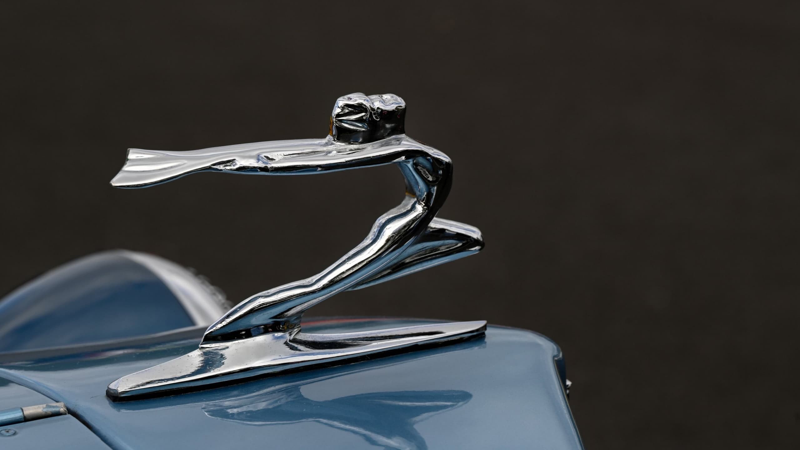 SOUTHEND-ON-SEA, UK - OCTOBER 05, 2025: Closeup Silver Lady bonnet mascot ornament on Beauford vintage car 