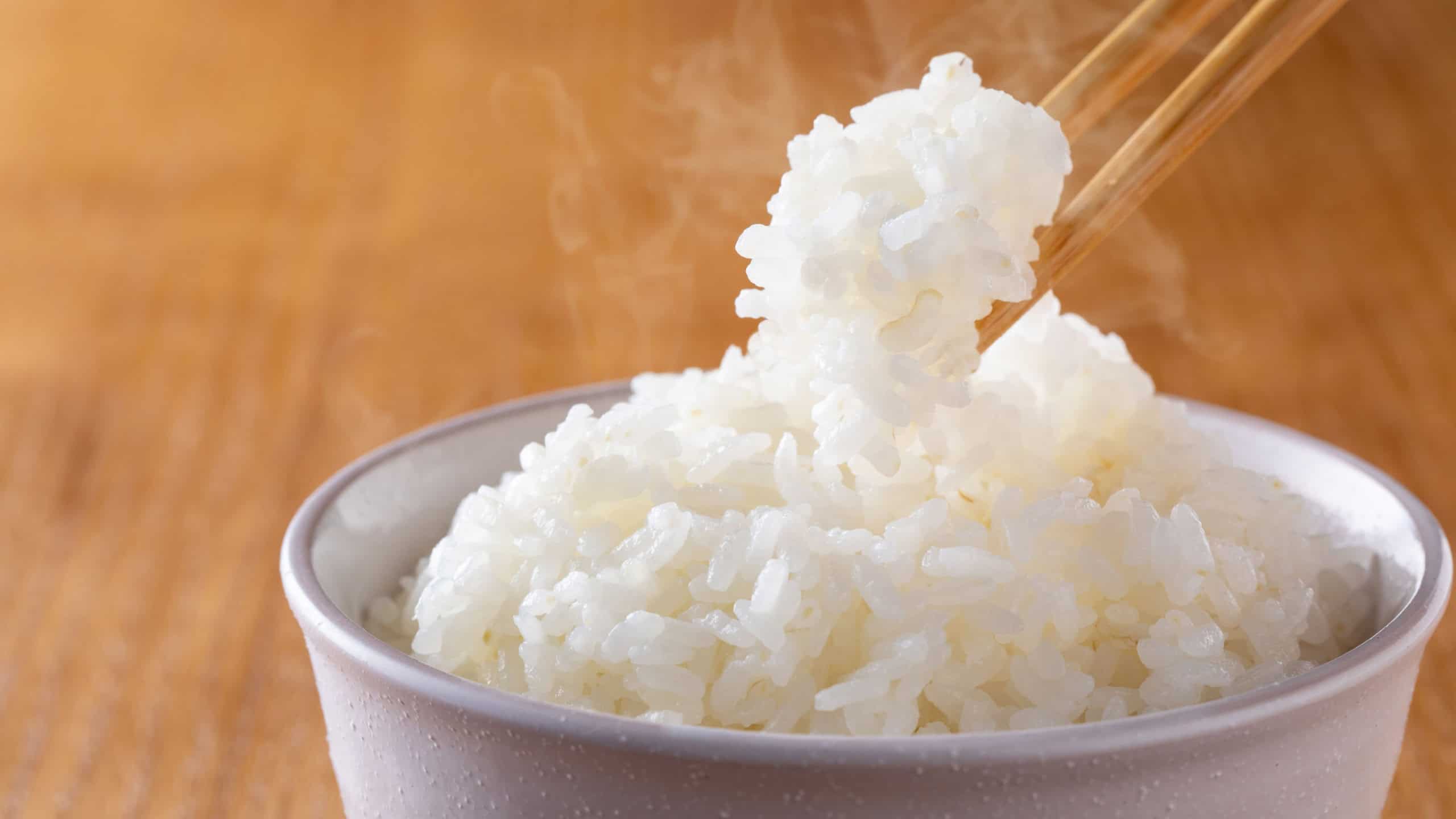Freshly cooked rice poured into a bowl