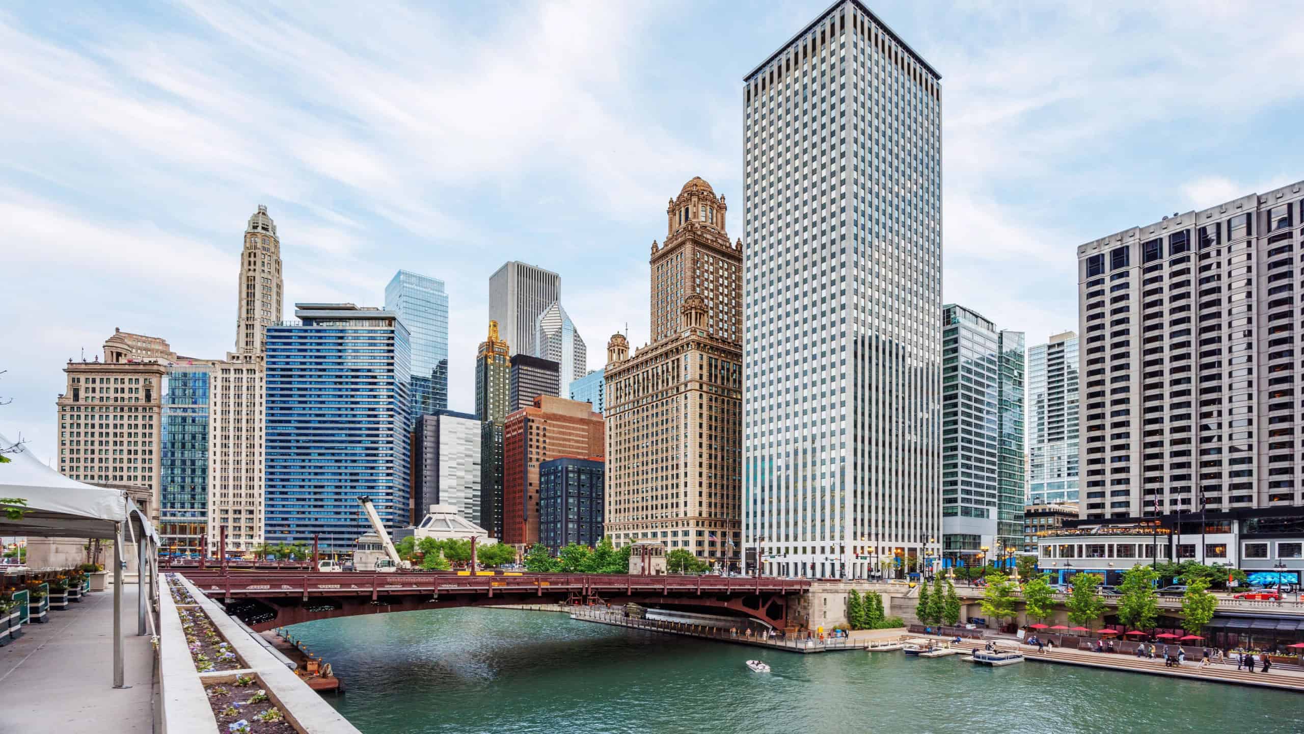 Vibrant view of Chicago downtown skyline under a summer sky, highlighting the city iconic architecture and urban energy