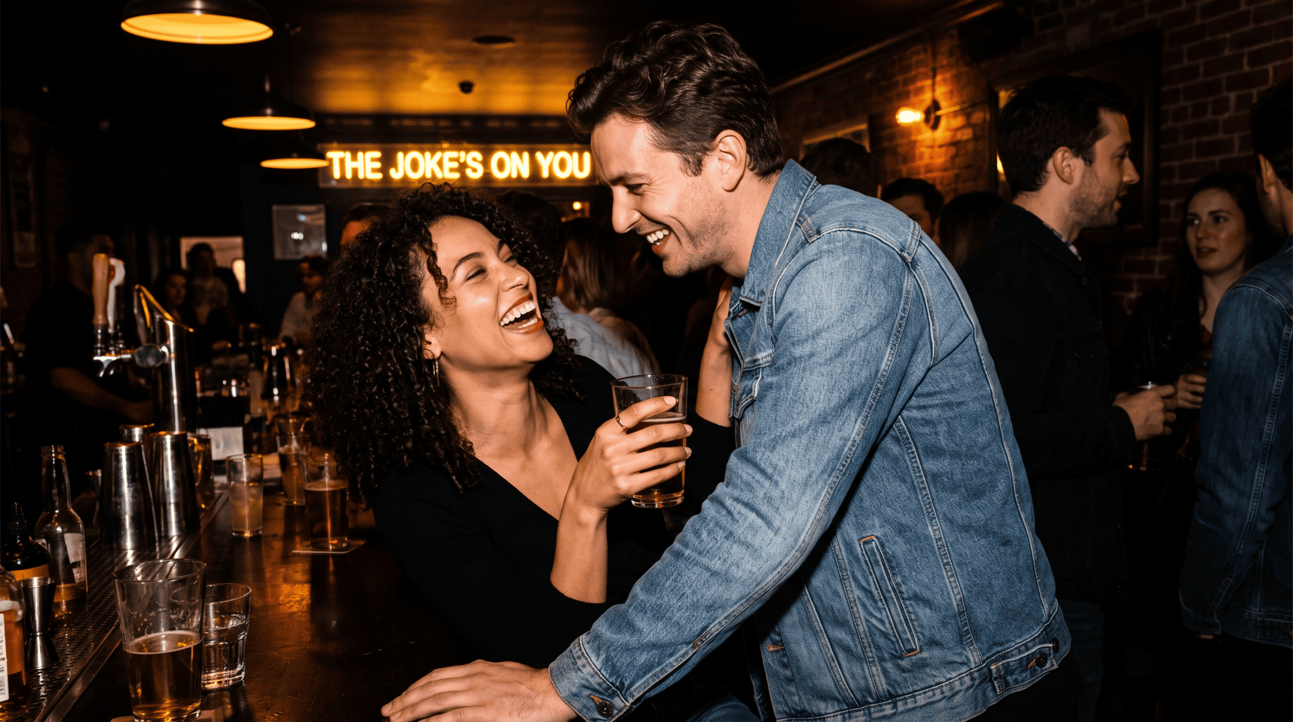 a couple laughing in a bar, flirting.