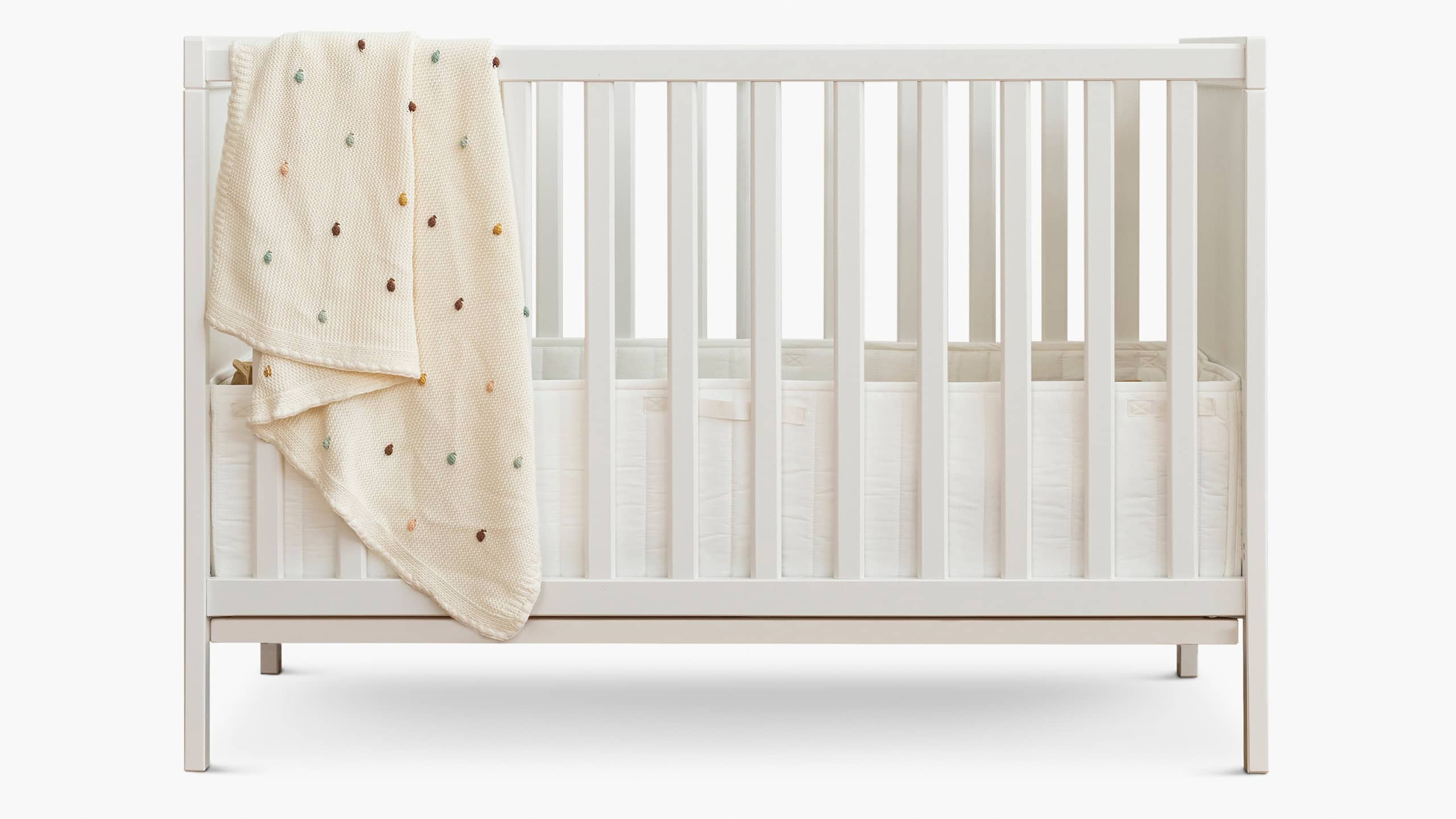 White wooden crib for baby room